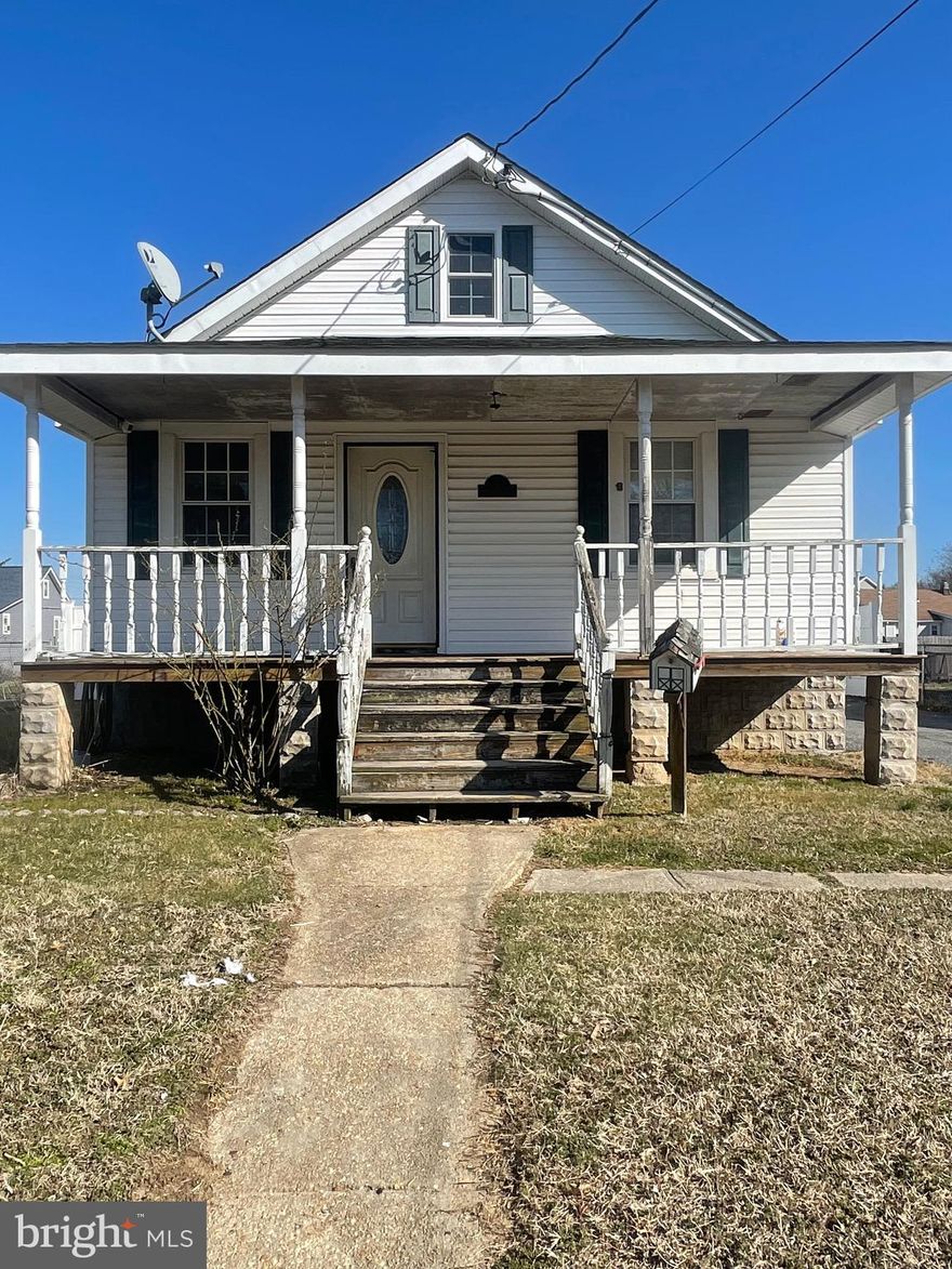 CALLING ALL INVESTORS!!! Great opportunity to fix the house they way you want it . Home currently has 2 bedrooms on main and a rough in 3rd bedroom on the 2nd level . The property is located in a water oriented community and for a minimal fee you can use the private beach with boat ramp! THIS IS A MUST SEE !!