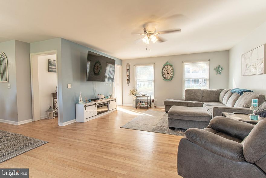 Nestled in the serene community of Matthewstown Run, this exquisite Colonial-style residence offers a harmonious blend of elegance and comfort. Built in 2003, this meticulously maintained home spans 1,920 sq ft and is set on a 0.29-acre lot that backs to lush trees, providing a tranquil backdrop for your everyday life. Step inside to discover a warm and inviting interior that boasts an open floor plan, perfect for both entertaining and everyday living. The main level features stunning hardwood floors that flow seamlessly throughout and tile in the kitchen, complemented by plush carpeting in the cozy bedrooms. The heart of the home is the spacious combination kitchen and dining area, where culinary dreams come to life. Equipped with appliances, including a built-in microwave, gas oven/range, dishwasher, and refrigerator, this kitchen is designed for both functionality and style. A charming breakfast area invites you to enjoy your morning coffee while basking in the natural light that pours in through the windows. The primary suite is a true retreat, featuring an en-suite bathroom and a generous walk-in closet, ensuring ample storage for your wardrobe. The convenience of a main-floor laundry area adds to the home's appeal, making daily chores a breeze. Outside, the property features a lovely patio, perfect for al fresco dining or simply unwinding in the fresh air. The attached garage, with space for two vehicles, offers both convenience and security, while the driveway provides additional parking for guests.  Enjoy the peace of mind that comes with living in a well-established neighborhood, where nature is just outside your door. Whether you're hosting gatherings or enjoying quiet evenings at home, this property offers the perfect setting for creating lasting memories. Experience the luxury of space, comfort, and nature in this beautiful home. It's more than just a place to live; it's a place to thrive.