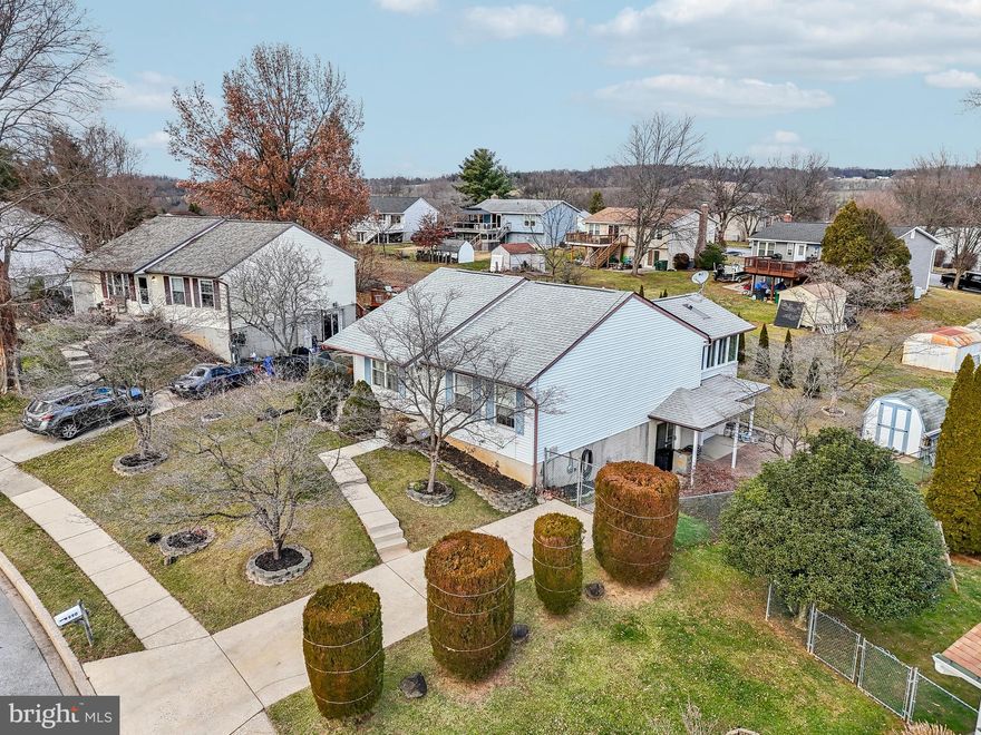 Rarely Available Outstanding home in "The Greens of Westminster".  Nestled in the ONLY cul-de-sac with their own grass field in the center to share with just 15 neighbors.  No need to go to a park to play tag, ball, or soccer, all without the responsibility of cutting the grass!  This 3 bedroom, 1 full and 2 half bath home is larger than it appears, with incredible updates. It is perfect for a ALL buyer's from the First Timer to those Downsizing.  The unique addition of a concrete block motorcycle garage includes heat and A/C to double as a Hobby/Tool room.  The Sun Room above has intricate wood features and skylights, and access to the Trex Deck.  The thoughtful and practical extended roof overhang and walkways keep you dry in wet weather.  Stainless Steel appliances in the updated kitchen with floor to ceiling cabinet storage, leads to the expansive basement Family Room which has an adjacent Game Room with a removable Dry Bar (you can make it a gym or anything you need).  An additional storage room is a pleasant bonus to store holiday decorations, precious items, documents etc.  The shed holds your lawn equipment and the fenced backyard will secure your kids, grand kids and pets.  This home is move in ready and waiting for you!  All within walking distance to the Westminster Municipal Pool, and less than 1.5 mi to Safeway, 3.2 mi to Walmart, and 3.6 mi to Cranberry Mall.  Contact me to schedule your private showing!