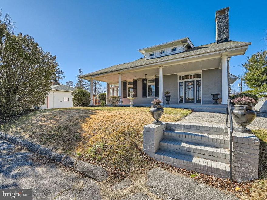 Newly remodeled 5BR/3 Full-2 Half BA expanded Craftsman style home of over 4300 finished sqft, boasting an abundance of original character with tons of added upgrades located in the Towson School District!  Ample parking is just steps away from the classic covered front porch featuring stately columns and a herringbone designed patio. The full glass front door boasts a large transom above allowing for natural light to flow through as you enter into this amazing home. Step into a large living room that features white oak hardwood floors, a wood beamed ceiling, a whitewashed stone wood burning fireplace with a natural stone mantel flanked by original stained glass windows, built-in shelving, and an open view into the glamorous dining room. The ideal space for hosting family gatherings is this exquisite dining room also featuring a wood beamed ceiling, chair railings, and classic wallpaper designed walls. Just off the dining room is a cozy sunroom with a terracotta tiled floor, and three walls of windows allowing tons of natural light. From the dining room pass by a half bath on your way to a beautifully designed kitchen offering plenty of cabinets finished with crown moldings, stainless steel appliances, a deep stainless sink under a window, granite countertops with a complimenting backsplash, and an island with butcher block countertops and seating for two or more. Past the kitchen, at the end of the hallway is a home office ideal for the "work from home owner".  Cross over into the "East Wing" to find a grand primary bedroom suite offering Brazilian cherry hardwood floors, a fully tiled private bath, a large sitting area, and a private entrance. Making your way up the yellow pine steps to the 2nd floor with vertical heart pine hardwoods throughout. At the top of the steps is an open loft that leads to a second primary sized  bedroom with a private bath featuring a walk-in shower, two sizable secondary bedrooms, a play room or possibly a fourth bedroom, and a full bath.  The lower level is finished offering an open floor plan with a built-in bar, a cedar lined closet, laundry, a half bath, and storage.  The newly landscaped yard is filled with tons of green space, a shed, and a large patio.  This home is move-in ready with so much to offer new homeowners including recessed lighting, a freshly painted interior, dual zone HVAC, and a newly installed French drain system.
Imagine all this and in close proximity to Towson's shopping and restaurants and commuter routes!