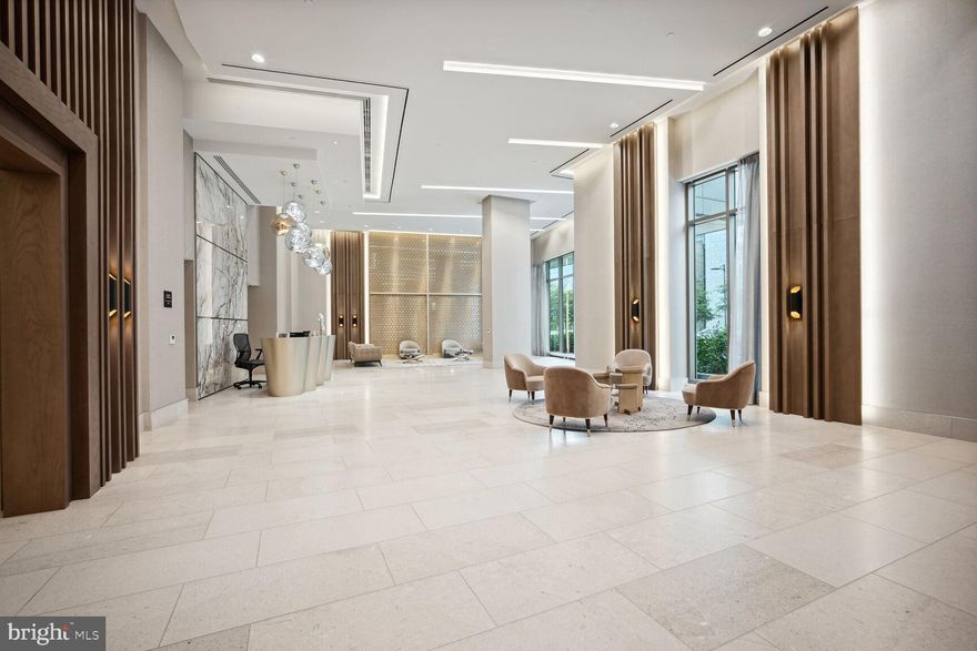 OPEN HOUSE CANCELLED FOR OCTOBER 27TH. An award winning Condominium, Best High Rise in Virginia, Maryland and DC. The moment you walk in you are taken by the light and view this residences provides. This spacious 2 Bedrooms with private Den, 2.5 Baths has 10 ft ceiling and is designed with you in mind. The contemporary inspired kitchen includes Italian high gloss imported cabinets, Miele appliances, and quartz countertops/backsplash. Quartz countertops are included in the Kitchen and all baths.  The floor-to-ceiling windows is equipped with solar shades throughout. The master bedroom includes 2 walk-in closets. The master bath includes; a large walk-in shower with seat, a floating tub, private water closet, and floor-to-ceiling built-in linen closet.  2 parking spaces and storage included. 

Step into into the elegant grand lobby and be greeted by a 24/7 concierge staff. A lobby attendant, property management and engineer are on-site. Monarch includes; a  Hospitality Suite convenient for visiting family/overnight guests, Roche Bobois designed club room with catering bar and catering kitchen, an inviting landscaped outdoor terrace with grilling, fireplace, and outdoor pool. A state of the art fitness center and vista room for private dining, Monarch is located steps away from Tysons Galleria, Tysons Corner, Tysons Metro, Wegmans, Harris Teeter, and Whole foods. The Capital One Concert Hall is also nearby. Walk to the metro or hop on the major highway with ease. This perfect home awaits you!

Pictures of the unit staged.