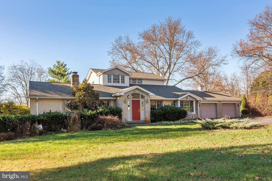 Nestled on 1+ acre, this gorgeous rancher-turned-Colonial (1990's) boasts a spacious interior w/rich character throughout! From gleaming hdwds to wood-burning fireplaces to a lux MBR suite-this home has it all! Adjoining formals, a sun-bathed FR & open concept kit w/granite offers easy lifestyle!+sprawling LL rec rm w/a rough-in for 4th FB! Recent updates: roof, flooring*, appls, granite, & more!