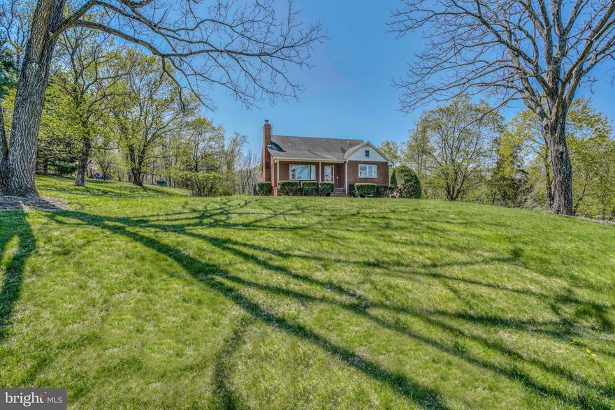 COUNTRY CHARM AT ITS FINEST!!  WONDERFUL, PEACEFUL LOCATION,  OFFERING GORGEOUS PASTORAL VIEWS!   THIS CHARMING 4BR, 2 BATH CAPE COD FEATURES A COZY KITCHEN WITH GRANITE COUNTER TOPS, GAS COOKTOP AND DOUBLE WALL OVENS, PERFECT FOR YOUR HOLIDAY ENTERTAINING.    A SPACIOUS FORMAL DINING ROOM, FAMILY ROOM WITH WOOD STOVE,  GLEAMING HARDWOOD FLOORS, 2 BEDROOMS AND UPDATED FULL BATH COMPRISE THE MAIN LEVEL.     THE UPPER LEVEL OFFERS TWO ENORMOUS BEDROOMS AND THE SECOND, UPDATED. FULL BATH.   THE UNFINISHED BASEMENT IS WAITING YOUR FINISHING TOUCHES, WIDE OPEN, TALL CEILINGS AND WALKOUT MAKE IT A PERFECT SPOT TO INCREASE THE FAMILY'S GATHERING SPACE.   DID WE MENTION THE HOME IS SITUATED ON OVER AN ACRE OF LAND AND OFFERS A NEW FULLY FENCED HORSE RING WITH A THREE SIDED HORSE SHED.  A SECOND SMALL RIDING RING AT THE BACK OF THE PROPERTY.   OVERSIZED 2ND SHED FOR STORAGE AND A DEEP FRONT PORCH TO ENJOY THE BEAUTIFUL SUNSETS!   THIS ONE IS PRICED TO SELL!