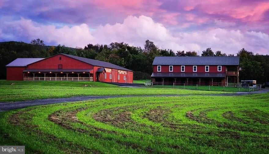 Exceptional equestrian property set on approximately 50 acres with two pole buildings.  Thoughtfully designed with purpose and functionality in mind, this property features numerous custom finishes throughout.
 
Building One: 40x84 with two stories, including a 1,800 sq ft barndominium with a covered porch facing west—perfect for relaxing while watching the sun set over the pastures. The living area features 2 large bedrooms, 2 full baths, and one half bath, enhanced by luxury finishes such as vaulted ceilings, a custom kitchen with granite countertops, and LVP flooring. The second story also includes a loft for additional hay storage. The ground floor barn area offers a 12-foot-wide aisleway, 6 stalls (5 with attached daylight runs), heated tack and utility rooms, a wash stall, and a sawdust bay. Also attached is an 18x70 garage addition with overhead doors at each end.

Building Two: 72x200 featuring a 72x120 indoor riding arena with sand footing over stone dust, a viewing area, 8 stalls (6 with attached daylight runs), a 14-foot aisleway, tack room, wash stall, hay storage above the stall area, and additional space for equipment storage.

Outdoors there is a 110x170 outdoor arena with sand footing and premium quality lighting.  Fenced pastures include two 5+/- acre pastures and two one-acre pastures, all with run-in sheds. On the west end of the property, a tree-lined area borders the Yellow Breeches Creek, while the remaining acreage has been used for hay production.

Professional photos and additional details will be added soon.  Experience the perfect blend of comfort and equestrian lifestyle—schedule your private tour today and see all this incredible property has to offer!