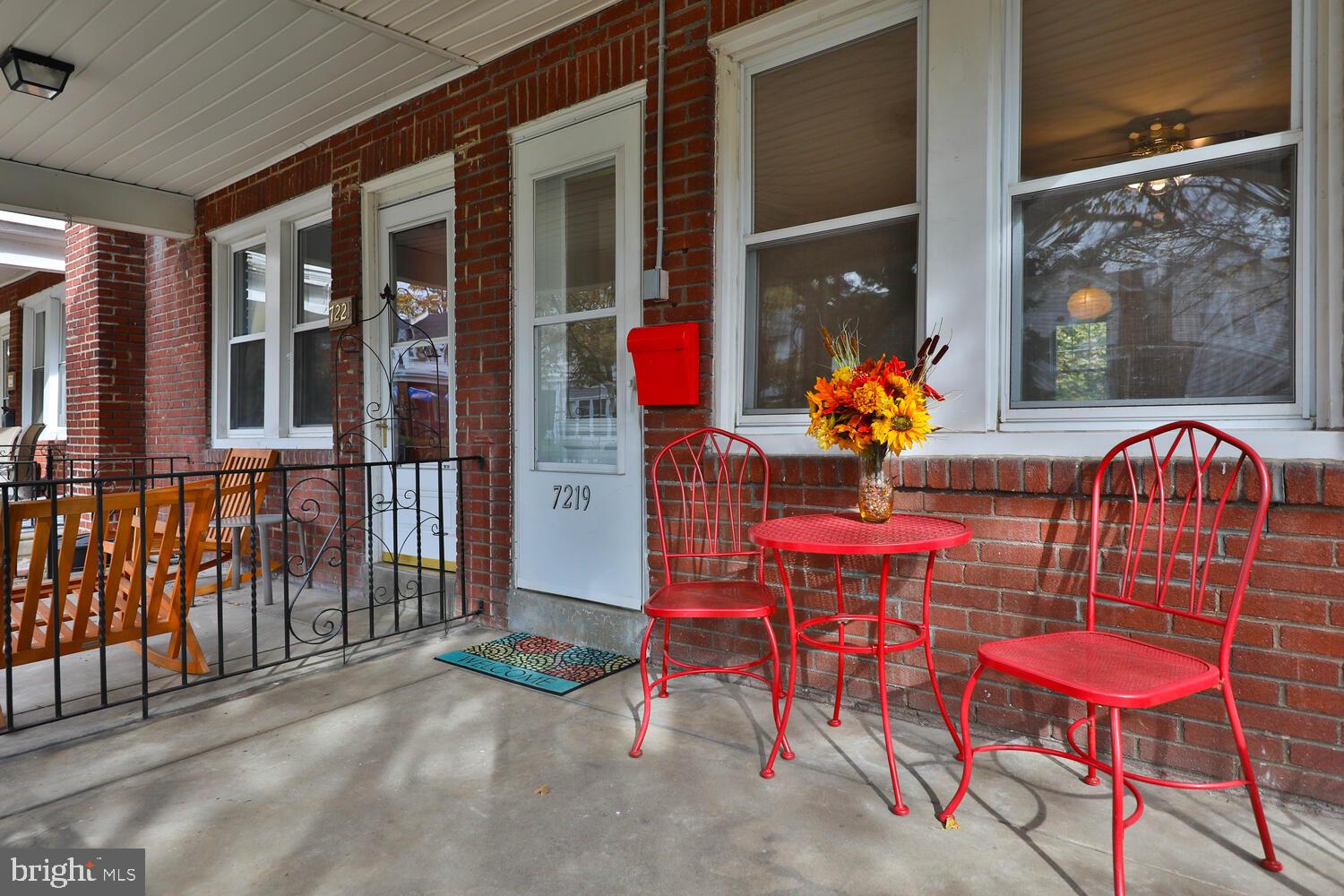 Welcome to this sunny 3 bedroom, one full bath row home located on a quiet one way street in Mount Airy. With hardwood floors, fireplace, front porch and back deck this house has lots to offer. The full bath has a working vented skylight. The house has been freshly painted and has a living room fan, and the fine original front door. There is ample space in the basement with nine foot high ceilings and  freshly parged walls for a workshop, artist studio or storage. The garage also has lots of space for outdoor equipment besides a good sized car.  You can also park in front of the garage door for additional car parking. This arrangement would lend itself well to a electric car charging station.  There is a shared green space across the alley driveway parking area for kids to play, have a BBQ or to just sit and meditate. There is a train station just down the street that is a quick commute to Center City. You can walk a few blocks to bustling Germantown Ave with its restaurants and coffee shops. There is a nearby playground,  Lovett Library and you can easily get to Fairmount Park and Forbidden Drive. Come see what this cozy home has to offer!