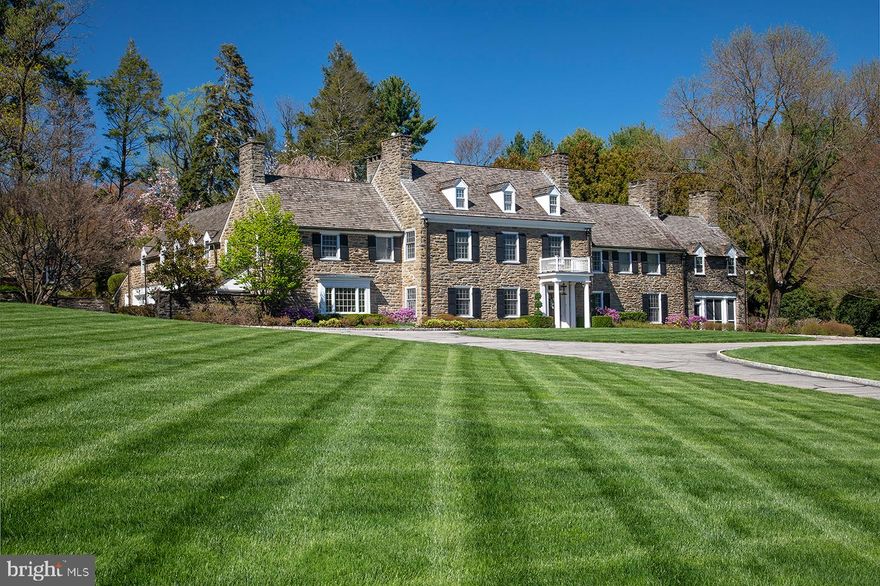 Linden Hall, a quintessential Main Line estate property, perfectly combines Main Line architectural sophistication, luxurious amenities and some of the most breathtaking views imaginable. The residence has recently been exquisitely expanded & meticulously renovated to reflect the floor plan and design sought by modern families. During 2015/16, highly respected builder Griffiths Construction completed renovations which reconfigured the kitchen, breakfast room and opened the adjacent staircase.  Custom cabinetry fabricated by the Amish craftsmen at Paradise Custom Kitchens was installed. The home theater was upgraded by Sound Waves. Elan smart home technology offer digital controls that operate security, lighting, HVAC, pool and media, all from a mobile phone.  Old world elegance includes handsome millwork, soaring ceilings, countless French doors, lovely fireplaces and timeless fixtures. The beauty is not just in the details, but on display in every room and out of every window. Majestically sited on over 4 acres, the estate grounds will wow you with its stately mature trees, specimen plantings, stone terraces, walled motor court, swimming pool and pool house.  Inside, highlights include grandly proportioned Living & Dining Rooms, a Gourmet Kitchen with adjacent Breakfast Room, Family Room & Study, spacious Recreation Room and luxurious primary Bedroom Suite with His & Her Baths. An exquisitely appointed Lower Level has an Exercise Room, retro-style soda fountain, Home Theater & Powder Room.  Privately located on one of the Main Line’s most prestigious streets, it’s easy to forget how conveniently close you are to everything.