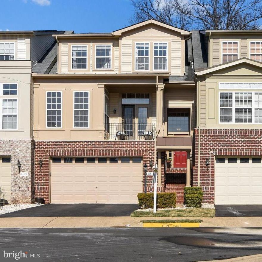 Stunning Miller and Smith Built Windmere model townhome with all the bells and whistles. On a premium lot backing to Community owned trees, this  quality built 3,086 sf home has  FOUR bedrooms, 3 1/2 baths and an oversized garage. Main level features include: hardwood floors, 2 story entrance foyer, Library/office, Living Room with terrace, Formal Dining Room, Kitchen with Large Breakfast area and Butler’s Pantry, Family room which opens to the kitchen and the deck. Upper level includes primary bedroom with private balcony and luxury bath, 2 additional large bedrooms share the 2nd bath. The laundry is also on this level.
The lower level features the perfect spot for entertaining with gas fireplace and access to the large deck, 3rd full bath and 4th bedroom for “in law suite” or au pair.
New Carpet, New HVAC, NEW BOSCH DISHWASHER, NEW RECESS LIGHTING ON MAIN LEVEL,. DECK BUILT IN 2020. Home is located on a cul de sac with extra parking and a playground. GREAT SCHOOLS    Be Sure to check out Virtual tour (click on movie camera in top line)! 
Home offers easy access to playgrounds, walking trails, tennis courts, swimming pools, shopping & restaurants. The new Ashburn Metro center (Silver Line), Route 267 and Dulles Airport are also close by. Total HOA fees include both Broadlands and Southern Walk @Broadlands for Internet.