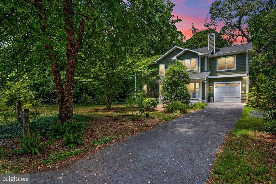 BACK TO ACTIVE! Looking for your Forever Home? A thoughtful architectural plan and renovation in 2011 turned this 1960s Rancher into a beautiful Craftsman Contemporary with superior grade features like HardiePlank siding and Andersen windows. Whether for groceries or paddle boarding, hardware supplies or hiking trails, this home offers quick access to what you need for life and leisure with its Annapolis Neck location and private entrance directly into Quiet Waters Park. Relish the open floor plan and nine-foot ceilings of the main level with its easy flow between the living, dining, and kitchen areas and the central staircase and fireplace as focal points. Oversized windows provide an abundance of natural light and most rooms boast woodland park views. Neutral paint tones, light oak floors, and 5-inch molding tastefully tie the spaces together. Enjoy cooking in your kitchen graced with blond maple cabinets, a stainless-steel appliance package, and granite peninsula. Two bedrooms and a full bath are unimposing and off to the side. Your large screened porch and deck overlook a fully-fenced rear yard abutting the Park s mature shade trees and natural landscaping that provides privacy. The upper level addition was designed with functionality and aesthetics at the forefront. Seek refuge in the expansive owner s bedroom complete with attached nursery/office, en suite bathroom, walk-in closet, and topped off with a sweeping view of Quiet Waters Park. The standalone clawfoot tub, double vanities, separate shower, and two commodes easily separate into TWO full baths via a Pocket Door. The private guest bedroom above the garage affords dual views of Park and street. The second floor surprise? A spacious family room with soaring built-in bookshelves, gas fireplace, oak floors, and immense window with built-in bench is perfect for everything from peace and solitude to family night or entertaining guests! Sleep at night secure in the fact that your home is protected by a modern fire-suppression sprinkler system and brand new whole-house generator. Enjoy all that each season has to offer - the warmth of a winter fire from one of your fireplaces, a summer cookout on your secluded, screened porch, Or, just walk out the back gate to enjoy the fragrance of spring or the vibrant colors of fall in the 340 acres of Quiet Waters Park!  Homeowners of Hillsmere Shores enjoy their water access community! It boasts a private marina on Duvall Creek with boat launch and direct access to the South River, a private sandy beach with pavilions and playgrounds, bike and jogging trail, and pool (memberships available). HOA fees are $25 annually. A special tax assessment $249 is included in the property tax bill for upkeep of the amenities. Professional Photos and Virtual 3D Tour to come soon.