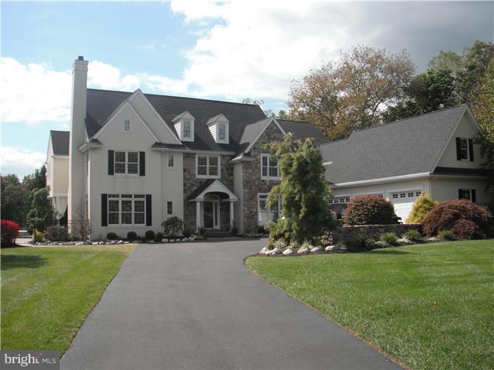 Majestically situated on 1.2 acres on Hampton Lane, this Chris McGinn masterpiece offers essentially every amenity needed for a carefree lifestyle as well as elegant entertaining. Upon entering the marble laid foyer, your experience begins in the vast array of beautiful built-ins, millwork, and adornment of stone and wainscoting in each room. The basement offers an additional 1200 sq ft of living space containing an extravagant entertainment area, oak laid wet bar, full bath and sauna. For the wine enthusiast, the hidden treasure; a stone and brick climate controlled wine cellar. Head outdoors to the personal putting green, Sport Court basketball court, in ground pool and spa all nestled in a beautifully landscaped stone patio. The 3rd floor offers the 6th bedroom/full bath combo suitable for an au pair suite. Indoor/outdoor state of the art audio/visual system, multiple fireplaces, butler pantry, 1st and 2nd floor laundry areas, built in beer tap and an epoxy floored 3 car garage and more.