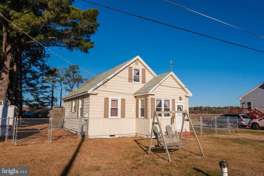 Check out this quaint and cozy bungalow on the edge of paradise in Wenona. Newer septic system (2015), new well and water softener (2016), replacement vinyl windows, updated flooring, new oil fired furnace and pellet stove, updated electric and plumbing, and new shed (2013). There is a first floor bedroom and an office, which could be used as another bedroom and 2 more bedrooms upstairs. Fenced back yard and deck are perfect for entertaining and the home is less than 1 mile to the Wenona Harbor Public Boat Ramp, offering exceptional fishing and crabbing opportunities. Some day trip options in the area are Virginia Beach (2.5 hrs), Ocean City MD (1 hr), Rehobeth/Lewes/Dewey Beach (1/1.5 hrs), Chincoteague/Assateague (1 hr) Schedule your showing today to secure your little slice of heaven on the Shore. Pontoon boat can be included.