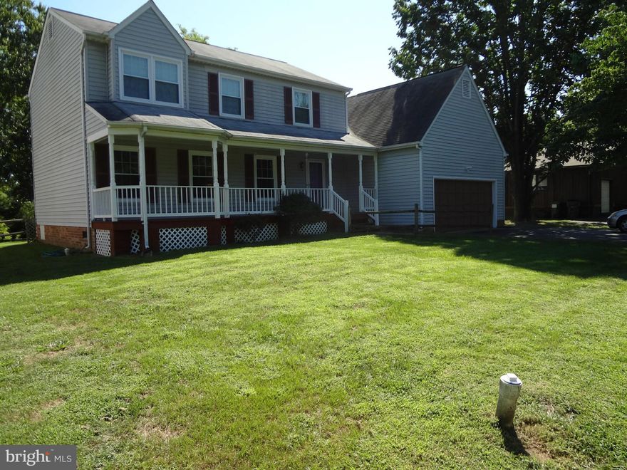 WATERFRONT. Family rm features cathedral ceiling, 2 skylights, pellet stove insert in raised hearth brick frpl, Atrium glass doors lead to spacious deck overlooking your own dock Schedule on line thru MRIS.  Bay window in kitchen area overlooks flat, fenced back yard. Mbr bath w/whirlpool tub. Wood floors in this lovely home. Formal living rm and separate dining rm.Owner pays move in fee and HOA.