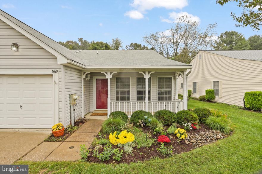Welcome Home to 969 Lanna Way.  This beautiful home has been meticulously maintained. It offers a low maintenance lifestyle in  Maryland's premier 55+ Community.  This two bedroom plus Den home offers a very well thought out floorplan with an exceptionally unique Cathedral ceiling in the living room. The home is sun drenched and has a light and airy feel.  The living room is welcoming and opens up into a refreshed kitchen (with new quartz countertops) and dining area.  A convenient breakfast bar is ideal for those meals on the go.  This home offers an open floorplan unlike many in this community where the kitchen is completely separated from the rest of the living areas.  The two bedrooms offer tremendous storage,with the primary offering a large walk in closet.  The primary bathroom has been recently refreshed with a large walk in shower and a double vanity with quartz countertops.  The hallway bath has been updated in neutral colors and is sure to impress.  The den offers a large double door to an oversized and very private rear yard witha beautiful brick patio.  It is rare to find a backyard with this much privacy in Heritage Harbour.  Another benefit of this home is the incredible neighbors that you will have.  They are very friendly and helpful and there is a strong sense of community.  Parking is abundant for your visitors and entertaining is a breeze.   969 Lanna Way (just completely repainted) is truly turnkey,  offering a one car garage with easy access to the kitchen . All major systems have been updated since purchase and your new home is ready for you to move-in.   The homeowners association in Heritage Harbour is second to none.  For a low monthly fee you have access to kayaking, swimming, tennis and unlimited activies in the community center.  The golf course is offered with very low use and cart fees.  We can't wait for you to see your new home.