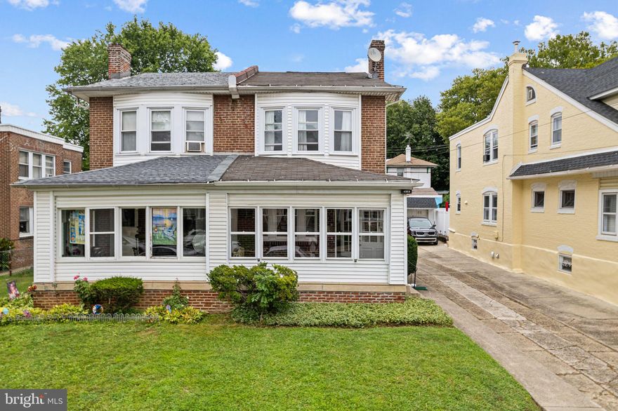 Welcome to this beautifully updated 3-bedroom, 2-bathroom home located on a tree-lined street in the heart of Tacony. Step inside through the inviting sunroom perfect for relaxing or greeting guests—then into a spacious living room with a cozy fireplace that flows effortlessly into the dining area.
The fully renovated kitchen is a standout, featuring sleek granite countertops, classic shaker cabinets, a timeless subway tile backsplash, and plenty of natural light, making it a space you’ll love to cook and entertain in. Upstairs, you’ll find 3  bright bedrooms. A beautifully updated full bathroom with elegant tile finishes completes the upper level. The unfinished basement provides extra storage and includes a second full bathroom with a stall shower. Out back, enjoy a private deck and a generous yard, ideal for outdoor gatherings or a quiet evening at home. A private driveway adds convenience and completes the package.