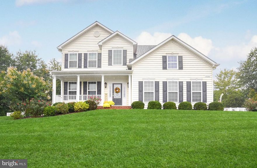 This exceptional home will exceed your expectations! Situated on one of the largest lots in the neighborhood (.48 acre!), your new home  offers an upgraded kitchen, spacious family room w/gas fireplace, and formal dining room, plus laundry room & 1/2 bath on the main level. Attractive kitchen has granite countertops, island, stainless appliances inc double ovens & microwave, ceramic tile flooring, and table space. Lovely hardwood in FR & DR! Roomy owner's suite has separate office/sitting room, and large walk-in closet; deluxe bath w/separate vanities, corner soaking tub, and tiled shower. Hardwood flooring throughout the second floor--gorgeous! Finished basement provides huge rec room, third full bath, and fourth bedroom. You will enjoy crisp fall days in your big back yard, fully fenced, with a new composite deck and cozy firepit on the patio! Extras include ceiling fans, lawn sprinkler system, pretty landscaping with lighting, storage shed, heat pump with natural gas backup, nat gas HW. Two-car garage with plenty of driveway parking. Nice tot lot/playground in the neighborhood; quick commute to NAS PAX!