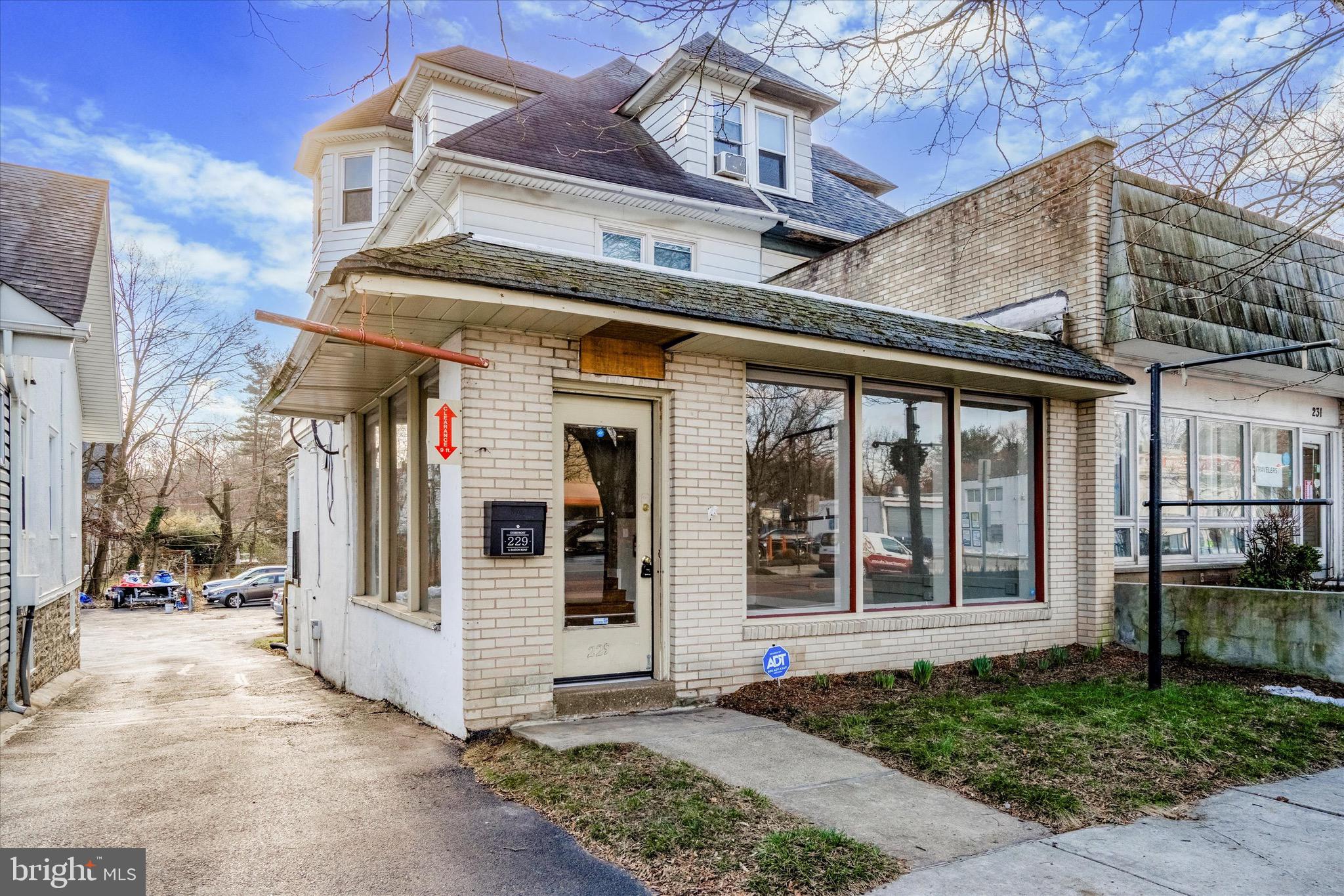 Introducing a versatile Fully Occupied 3250 Sqft, commercial and residential, mixed-use property in the bustling Glenside area. This unique building comprises three distinct units, offering a range of potential uses to suit your needs. Unit #1 presents a main level Store Front Space with 2 Working Spaces, a Powder Room, and convenient basement access to extend the service area or for storage needs. Unit #2 features a cozy one-bedroom apartment complete with a Living Room, Kitchen, and Bath, accessible via a separate side entrance. Unit #3 expands into a spacious 4-bedroom apartment offering ample living space, alongside a well-appointed Kitchen and Bath. The property boasts a driveway leading to a parking area, including three dedicated parking spaces at the rear, supplemented by on-street parking options in front of the building. Enjoy the convenience of being centrally located near Shopping, Restaurants, Libraries, Universities, and major transportation routes such as Route #309. With easy access to SEPTA Bus and Train lines, this property is primed for success as an investment opportunity or owner-occupied space. Explore the potential of this prime Glenside property today - schedule a viewing to experience its unique offerings firsthand.