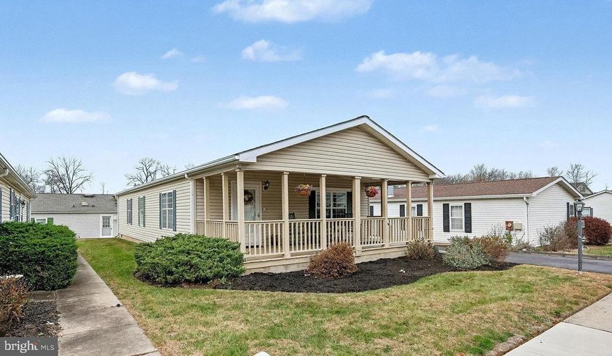 Could a change in lifestyle be in your future? Perhaps downsizing or enjoying a low-maintenance way of life in a peaceful setting? This beautifully updated, one-story home in North Wales, PA, could be the perfect fit for you. You own the home and the lot in this highly desirable 55+ age-restricted home. With a welcoming and spacious layout, this home features new luxury vinyl plank flooring in the kitchen and both bedrooms, along with brand-new neutral wall-to-wall carpet throughout the rest of the home. 
Step onto the inviting covered front porch, a perfect spot to enjoy your morning coffee or relax in the evening. The property also boasts a handy shed for additional storage needs.
The bright and airy kitchen is a delight, complete with white appliances including a refrigerator, 4 burner gas range, double bowl sink, and dishwasher. A unique island with built-in cabinetry offers the perfect place for displaying glassware or collectibles. Adjacent to the kitchen, the cozy living area offers plenty of space for relaxing and entertaining. 
The spacious owner's bedroom suite is your private retreat, complete with a full bath and two closets for added convenience. The ensuite bath features a walk-in shower with two built-in seats, grab bars, a large vanity with ample counter space, medicine cabinet and a linen closet. The second full bath, located in the hallway, includes a tub/shower combo and a sink with vanity.
This home also offers a well-equipped laundry area with a stacked washer and dryer, as well as a heater closet and a large free-standing storage cabinet/pantry. There’s also a door leading to the side yard, perfect for accessing the driveway or yard.
The community amenities include a clubhouse ideal for socializing with neighbors. This home is near shopping, dining, and major highways. Minutes to Amber or Skippack, the Montgomeryville shopping area, and restaurants. The home is ready for your personal touches to make it truly your own. Come and enjoy easy living in this charming, well-maintained home which is excellent for anyone looking to embrace a more relaxed lifestyle in a welcoming, vibrant community.
Don't miss out, schedule a tour today!