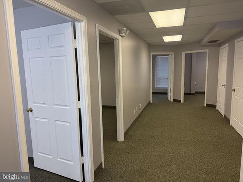 Photo of 13190 Centerpointe Way #101, WOODBRIDGE, VA 22193 (MLS # VAPW2116132)