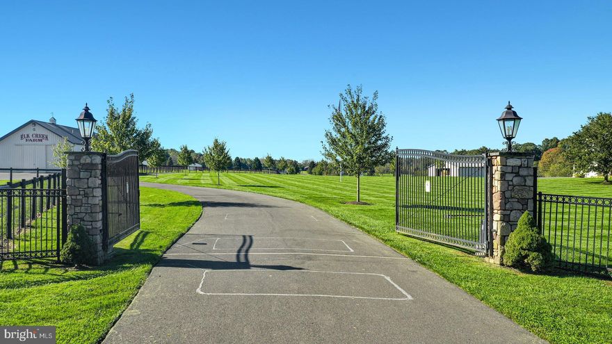 An incredible property and opportunity in scenic Bucks County!  These 98 acres of prime land with incomparable views, sweeping pastures, and gated entrances awaits the next steward to continue the tradition of the renowned Elk Creek Farm, a Black Angus breeding farm.  This remarkable compound includes a spacious Cape Cod house, a guest or caretaker’s apartment, the main barn, three Morton buildings and numerous run-in sheds and the potential to add another dwelling. The beauty of the land is unparalleled with expansive lawns, rolling pastures and panoramic views. This home is designed for comfort and entertaining.  Light filled, and spacious, with an open floor plan for entertaining. The kitchen is a central gathering place with marble countertops, center island, breakfast room area and a breakfast bar peninsula open to the living areas. A primary bedroom/bathroom suite and another bedroom with door into hall bath are on the main floor. Upstairs are two more large bedrooms and a full bath. There is also a paver patio from which to enjoy views, and a full basement with walk-out.  Above the 2-car garage is an apartment with a separate entrance.   A multi-use area to suit your needs, it has a living room, full kitchen, a bedroom with walk-in closet and bathroom. The agricultural amenities are the focal point of this exceptional property. The main heated barn was designed to support a breeding operation with a bluestone patio at the covered entrance and an air-conditioned office and half bath.  Four stalls, designed for stallions, have adjoining paddocks, hayloft, and wash stall.  One Morton building houses the equipment barn with run-in and 3 stock and 2 stalls. Two other Morton buildings also have run-ins and enclosed stalls. There are heated, automatic waterers, paved roadways and no-climb fencing.  Everything here is first quality and offers a complete package to accommodate your operation.  Experience beautiful living with all the historic beauty that Bucks County has to offer, from recreational and cultural activities to fabulous entertainment and dining venues located between New Hope and Doylestown – all while being a comfortable distance to Philadelphia, Princeton, and New York.  The possibilities are endless.