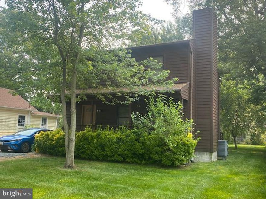 Lovely 3 Bedroom, 2.5 Bath Colonial Home with over 1,600 sq ft of Living Space in a family oriented neighborhood with Chesapeake Bay Water Privileges. Main Level: Kitchen with hardwood flooring, pantry, lots of counter space and breakfast bar seating, dining room, living room with cozy wood burning fireplace and a half bath.

Upper Level: Primary Suite with private, full ensuite bathroom, convenient upper level laundry room, 2 additional bedrooms and a full hall bath. Outdoor Space: Level fenced back yard, deck, front patio and storage shed. Neighborhood Amenities Include: Beach, Boat Dock/Slip, Boat Ramp, Pier, Picnic Area, Baseball Field, Basketball Courts and Playground.

Great location with award winning schools.

Home is being sold in "As Is" Condition.