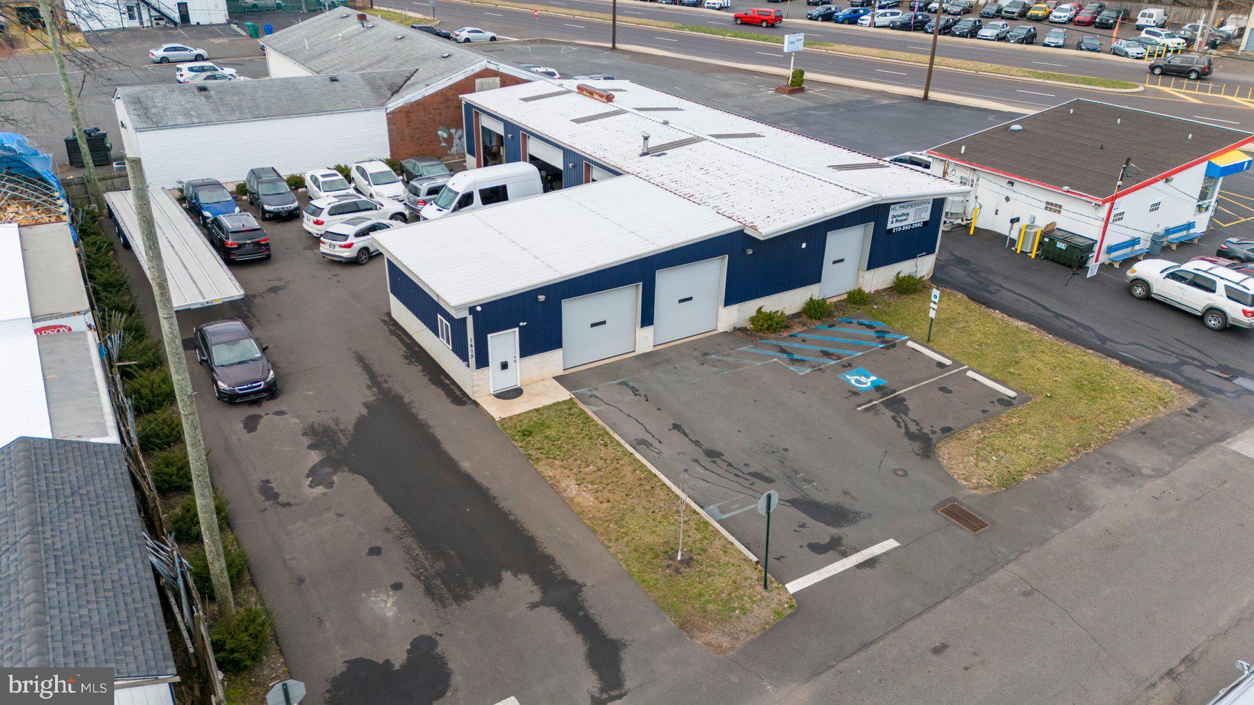 Seize this incredible opportunity to lease a fully equipped, high-visibility auto repair, body, and detail shop in the heart of Levittown! Perfectly positioned along Bristol Pike (Route 13), a major thoroughfare with constant traffic and unmatched exposure, this 3,679 SQ FT building at 1413 Elkins Ave offers a turnkey business opportunity for auto professionals looking to establish or expand their operations. Designed to accommodate a mechanic shop, body repair facility, and a detail center, this versatile property features seven spacious service bays, soaring 14-foot ceilings, and three electronic lifts, providing an ideal setup for high-volume service and efficiency. The thoughtfully designed layout includes a dedicated office space, a customer restroom, and a separate mechanics' bathroom, ensuring both functionality and comfort. Additionally, a separate detail center expands the revenue potential, making this a prime investment in a thriving market. What sets this property apart is the comprehensive equipment package included in the lease, allowing the next tenant to step into a fully operational, profit-ready facility without the burden of upfront capital costs. Ownership is offering exclusive access to a wide range of professional-grade equipment, including three lifts, a tire machine, two commercial gas heaters, balance machine, mobile oil tanks, an air compressor, welding machines, antifreeze and washer fluid tanks, oil drums with pumps, storage bins/compartments and much more, ensuring seamless operations from day one. To enhance durability and efficiency, the property features a recently replaced roof with skylights, providing ample natural light while reducing energy costs and maintenance concerns. The exterior lot is a game-changer, providing parking for up to 30 vehicles—a rare find that ensures effortless access for customers, staff, and vehicle storage. With prime exposure in a high-traffic commercial district, this location guarantees a steady influx of customers while offering convenience and visibility that few other properties can match. Strategically located just minutes from major highways and a quick 10-minute drive to Interstate 95, the site provides seamless connectivity for employees, customers, and suppliers alike, making it an ideal hub for any automotive business. Whether you’re an established auto professional seeking to expand your operations or relocate to a fully equipped, high-visibility facility, this prime commercial space provides everything needed for continued success. With top-tier equipment, ample parking, unbeatable exposure, and a layout designed for efficiency, this turnkey opportunity allows you to step in and start servicing customers immediately in one of Levittown’s busiest automotive corridors. This exceptional leasing opportunity won’t last long. Don’t miss out on this promising opportunity. Contact us today to learn more and schedule a tour!