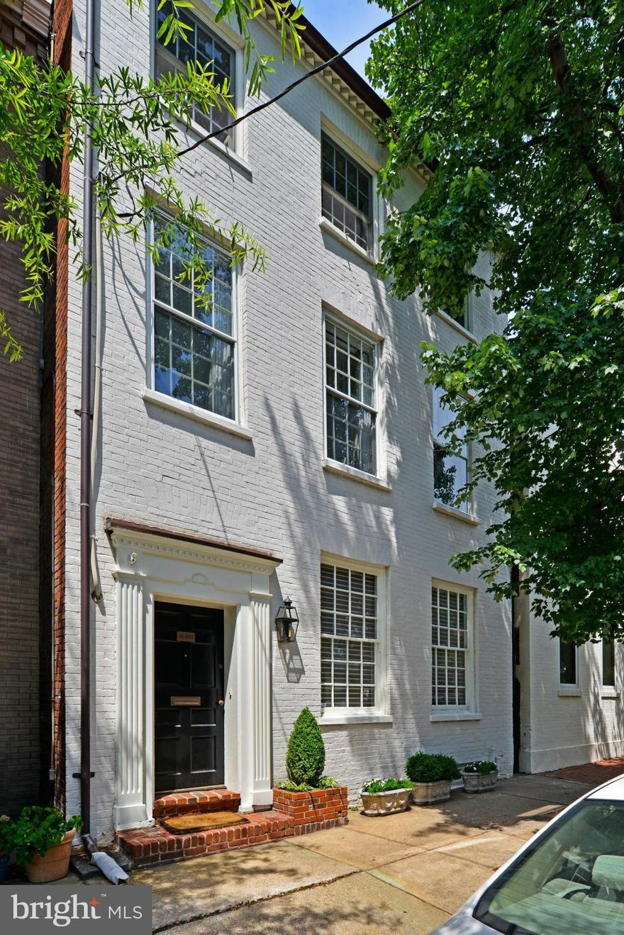 PARKING in Old Town is easy with TWO OFF-STREET SPACES beyond a sheltered garden with secure gate in this 19th century gem with large gracious formal rooms,  warm wood floors, period woodwork, a stainless kitchen with eat-in space, additional kitchenette, luxurious master suite, in-law/aupair suite, large bedrooms, front and rear stairs.  Great space & light throughout!