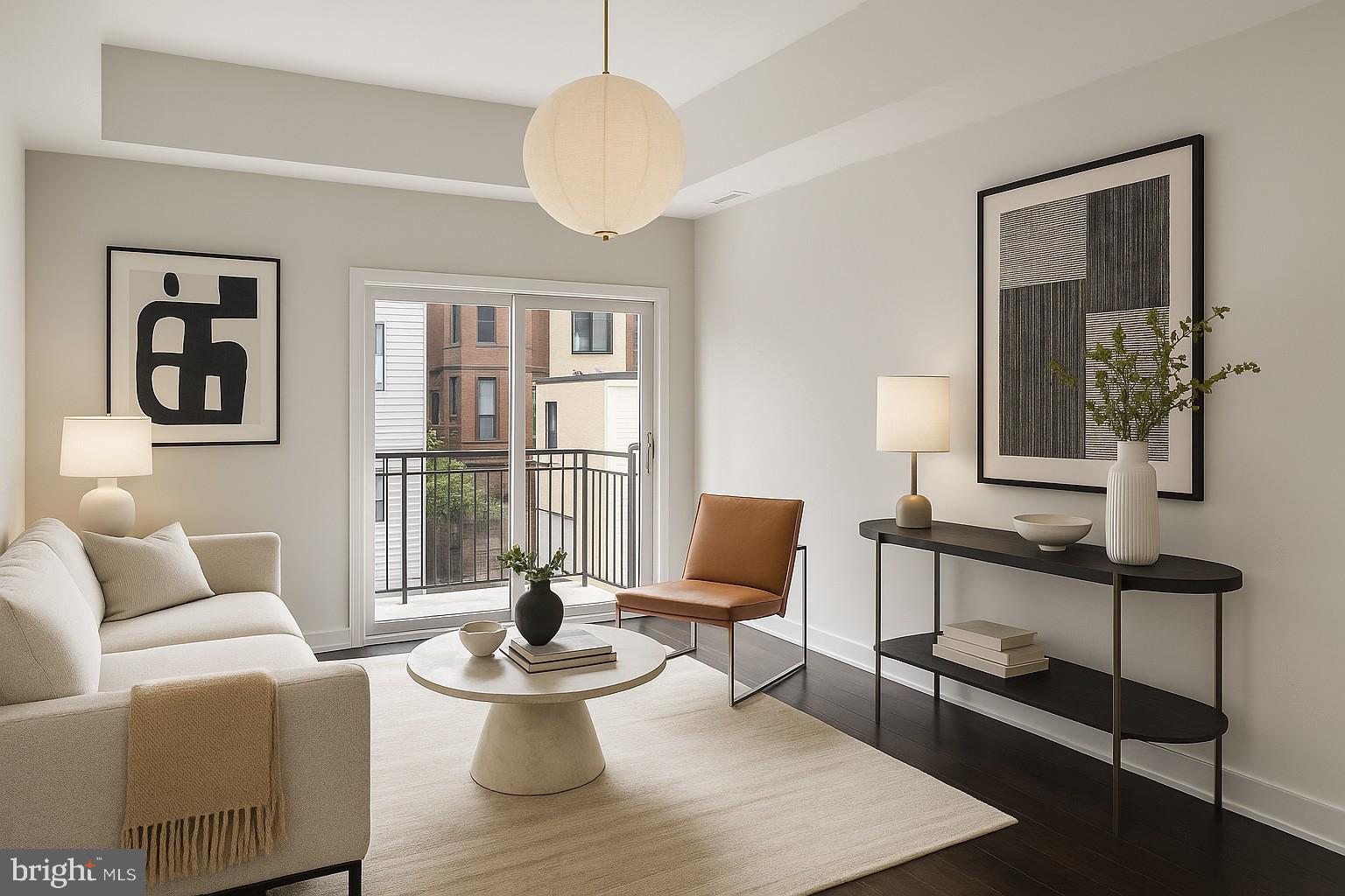 Tucked in the heart of East Kensington, this beautifully designed 2-bedroom, 2.5-bathroom townhouse-style condo offers the perfect blend of comfort and convenience. The open-concept layout welcomes you into a spacious living area with hardwood floors, recessed lighting, tall ceilings and a spacious balcony (great for a little bistro table!) The gourmet kitchen is a standout featuring crisp white cabinetry (with large pantry cabs!), brushed nickel hardware, stainless steel appliances, and a custom tile backsplash. On the lower level (but still above-grade), the sun-drenched primary suite impresses with a full wall of windows, generous closet space, and a spa-like en-suite bathroom. On the same level you'll also a dedicated laundry area (full-size, side-by-side machines) as well as a powder room to serve your guests. Upstairs, a second bedroom with its own en-suite bath, hardwood flooring, and oversized windows provides a peaceful private retreat for guests or as a workspace. Capping it all off is a private rooftop deck with awesome views of the city—an ideal space to relax or entertain under the stars. Additional highlights include ample storage throughout, and the added bonus of multiple years remaining on the tax abatement (and it's worth noting - it's the more desirable old variation of the FULL 10 year abatement, not the newer graduated version) —making this home as practical as it is beautiful. Steps from East Kensington hot spots like Little Walters, Dream World Bakes and the gorgeous Hagert Street Playground and Collins Smith Barrick Play Garden. Schedule your tour today - easy to show!
