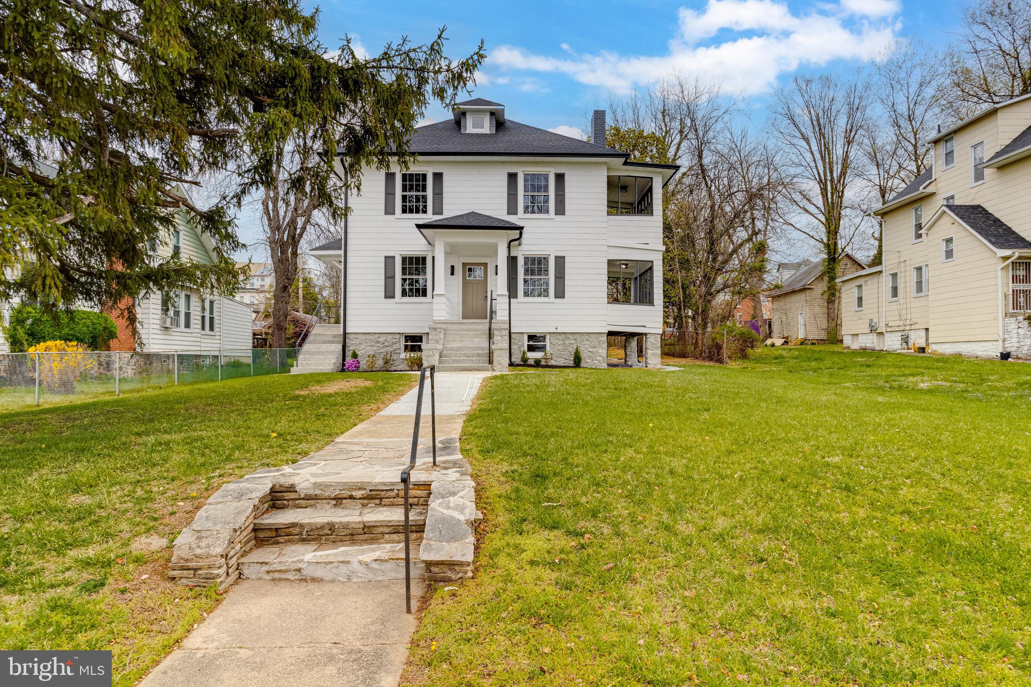 Beautifully renovated 7-bedroom, 4-bathroom home located on a quiet street in Gwynn Oak. This spacious, move-in ready home features an open concept layout with plenty of natural light, a designer kitchen with quartz countertops, a 10-ft island, and stainless steel appliances. The primary suite includes a sitting area, fireplace, large walk-in closet, and private side porch. Generously sized bedrooms throughout include walk-in closets, and there are two laundry rooms for added convenience. The fully finished basement includes a bedroom, full bath, and separate entrance—perfect for guests, in-laws, or potential rental income. This home has been fully permitted and updated with all-new electric, plumbing, and HVAC systems, including dedicated AC/heat on the top level. Additional features include a rear parking pad, a nice-sized yard, and a second side porch on the main level. Don’t miss this rare opportunity to own a beautifully updated home with space, comfort, and style—schedule your private tour today!