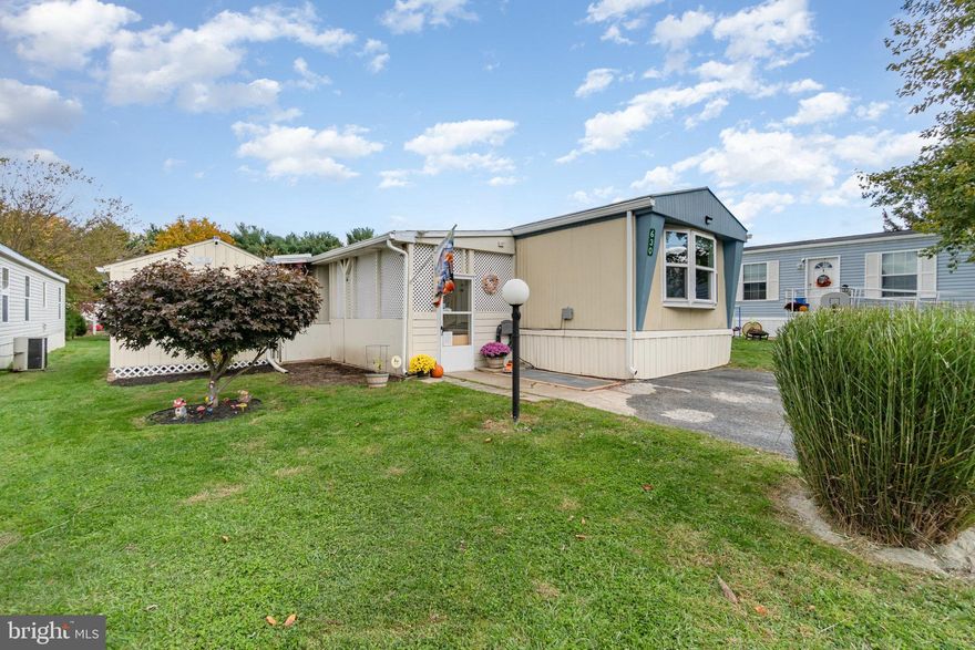 Open the door and, wow! you'd never think you're in a manufactured home.  This extensively updated property offers modern amenties and enhanced efficiency. The kitchen features new appliances,  a beautiful butcher block topped center island, and updated lighting.  Bathrooms received new concealed trap toilets and the primary bath includes a quartz topped vanity. The home boasts smart thermostat and lighting features, new ceiling  fans,  custom cellular shades, and fresh paint.  A new HVAC system (Nov 24)  tops the list- changing the heating fuel to propane and adding central air!  Outside, you'll see new gutters, a fully renovated and insulated shed, and significant landscaping, including a paver walkway,  firepit area, and pad for refuse storage.  Set on a quiet street, this  is a fantastic opportunity to 'have it all' for an affordable price.