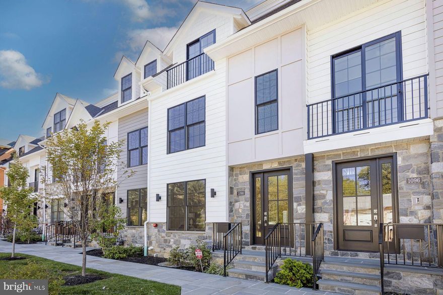 Introducing The Grove, a distinguished collection of 12 custom luxury townhomes with two end units located in the heart of charming and historic Wyndmoor. Now in its second phase, this boutique enclave offers spacious, sun-drenched homes with 3–4 bedrooms, 3 baths, and 3,298 sq ft of thoughtfully designed living space. Wide-plank White Oak floors and 9’ ceilings create a sense of timeless elegance throughout. Select homes include private elevator access (limited availability).
The main level showcases a light-filled open-concept layout anchored by a sleek linear gas fireplace and transitions seamlessly into a generous dining area and gourmet kitchen featuring quartz countertops, premium stainless steel appliances, and an oversized island with ample seating and storage. Sliding glass doors open to a private Trex balcony, perfect for morning coffee or al fresco dining. Upstairs, the serene primary suite offers a spa-inspired bath and large customizable closet storage solution, with a second en-suite bedroom and convenient laundry nearby. A private rooftop terrace with IPE pavers offers elevated outdoor living. The entry-level includes a flexible suite with full bath, ideal for guests, in-laws, or a home office; plus a mudroom and attached 2-car garage. The finished lower level provides space for a media room or private guest suite. Smart home pre-wiring included.
Experience the perfect balance of luxury suburban living and urban convenience, with easy train access to Center City Philadelphia. Enjoy being just steps from local parks, cafes, restaurants, and shopping, and only minutes from Chestnut Hill and the Wissahickon Trail. Excellent schools and a strong sense of community make this neighborhood especially desirable. Don’t miss your chance to make The Grove your own, where comfort, modern style, and vibrant surroundings come together to create an exceptional place to live.