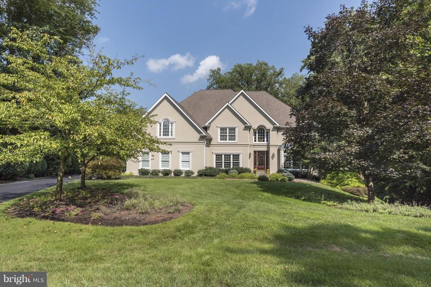 Belvoir Farms home boasts 4BR/4.5BA on oversized private lot with in-ground pool & multiple decks.High ceilings,hardwood floors, Family room w/ stacked stone Fireplace, updated kitchen w/granite & SS appliances.  Master suite and sitting room, gas fireplace & Spa-like bath. Finished lower level with custom bar and gym. Oversized 2 Car garage.