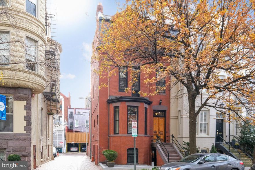 Fantastic Opportunity to own an elegant historic residence, that offers 5  BDRM 5.5 Baths,  secured 1 car parking, and an elevator,  located in one of the most desirable tree-lined streets in DuPont, steps away from the METRO, the Phillips Gallery, Cosmos Club, Farmers Market, and distinct shops and restaurants. Built in 1883, for the daughter of Judge Hillyer, the Hillyer House, retains many of the original details such as the original wooden double door entrance, built-in shelves, high ceilings, pine floors, moldings, fitted shutters, pocket doors, ceramic tile mantels depicting scenes from around the world. The main floor offers a living room, parlor, dining, kitchen, powder room, and deck off the dining. The kitchen features a breakfast bar, Corian counters, a skylight, Swedish flooring, and ample storage. Underneath the kitchen is a large storage area with a workbench . The lower level, offers an in-law suite with separate front and back entrances, a bedroom with a heart of pine wood flooring, decorative fireplace, bath, laundry, kitchen, and an original cast iron cook stove from the 1890s.. The upper-level one offers 3 bdrm  and 2 baths and the upper-level two offers a penthouse-style, master suite, and bedroom turned into a custom closet. 
***Additional details***There are multiple zones of heating/cooling to preserve energy in the house. The stained-glass skylight on the top floor was custom-made by an Oregon artist to showcase the ginkgo tree,  as reference to ginkgo trees growing on Hillyer Pl.