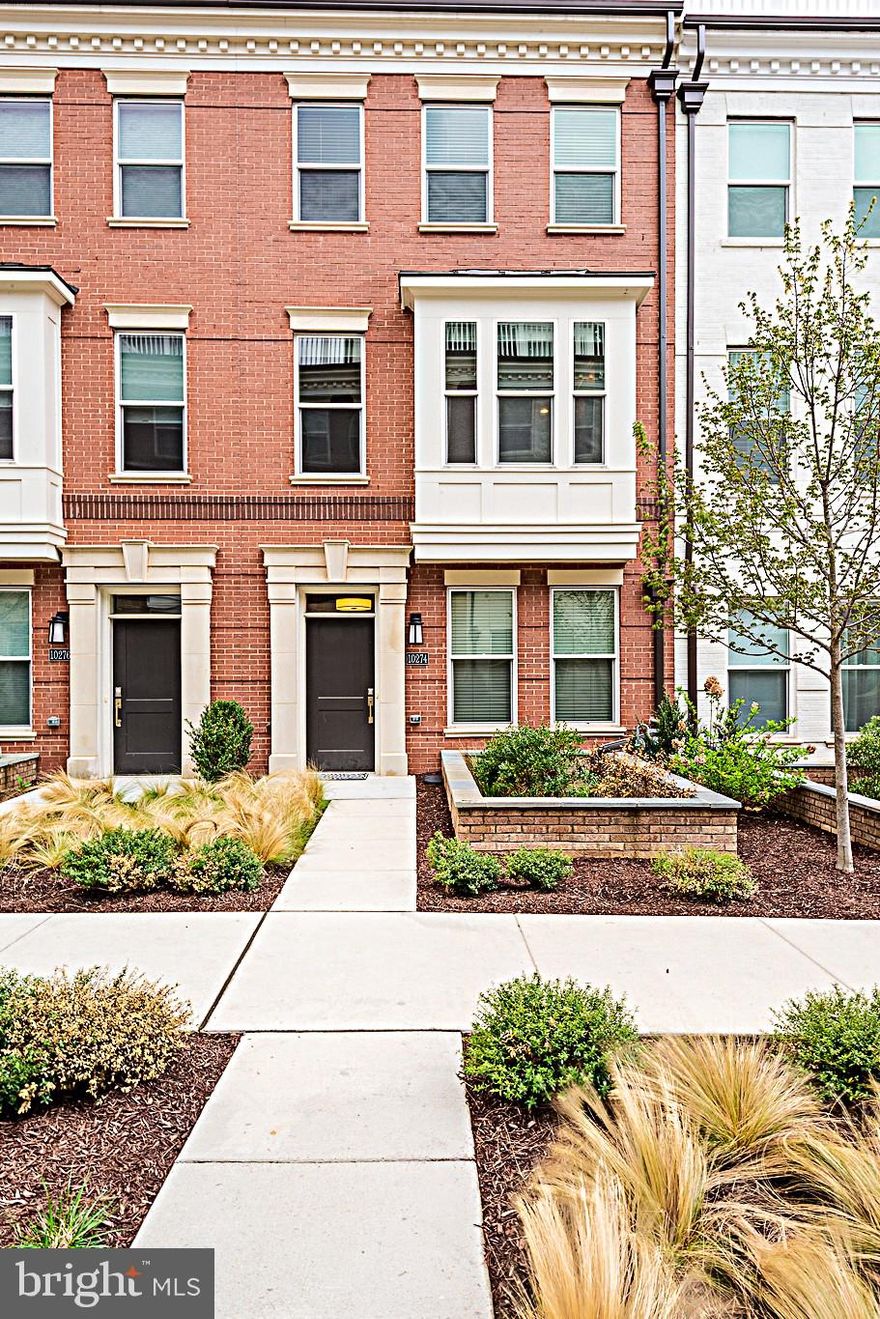 Sophisticated 4-level ELEVATOR townhome steps to Grosvenor-Strathmore Metro offers true lock-and-leave luxury and an unbeatable North Bethesda location. Better than new and built in 2022, this 4BR/4BA home features wide-plank hardwoods, soaring ceilings, and a bright open main level anchored by a chef’s kitchen with quartz counters, 42" cabinets, tile backsplash, stainless appliances and large island. The private elevator services all levels, creating effortless everyday living and ideal aging in place. Retreat to the spacious bedroom suites with stylish tile baths, or enjoy two incredible outdoor spaces: a main-level deck plus a spacious rooftop terrace perfect for entertaining or relaxing. Energy-efficient systems, smart thermostat, tankless hot water, and low-maintenance exterior complete the package. Sought-after Townes at Grosvenor Place is minutes to Strathmore, Pike & Rose, Wildwood, Rock Creek Park, NIH, Walter Reed, I-270 and I-495.