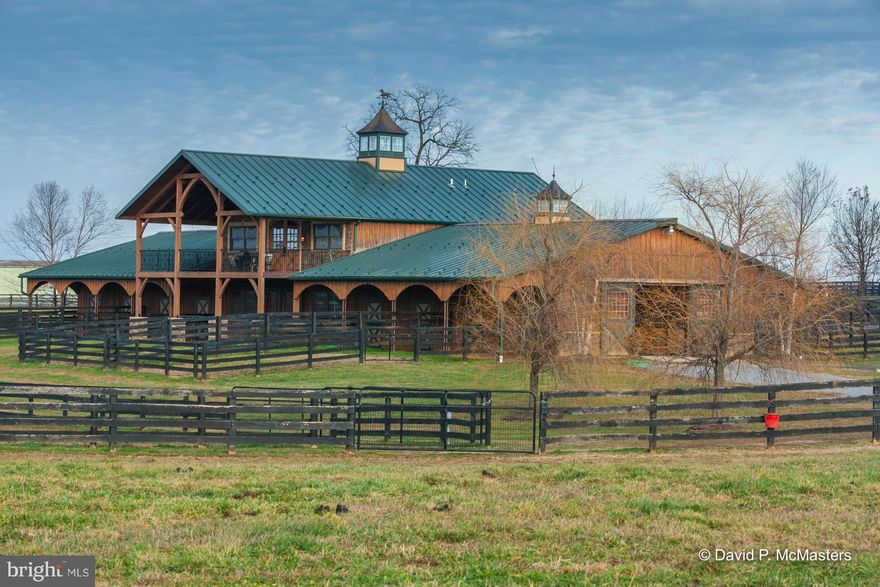 Top of the line horse farm! 114 acres, board fenced, fabulous 16 stall  post/ beam barn w/ upper luxury 1296 SF  apt. w/granite, tile, wood floors, covered balconies. Mobile for farm manager. Run in sheds. Stalls, removable dividers, heated waterers. Wash stall, Tack room. Fronts 3 roads. Could be grand estate or big lot development Near Charles Town Track/Hollywood Casino. 50 mi to DC. PRICE DROP