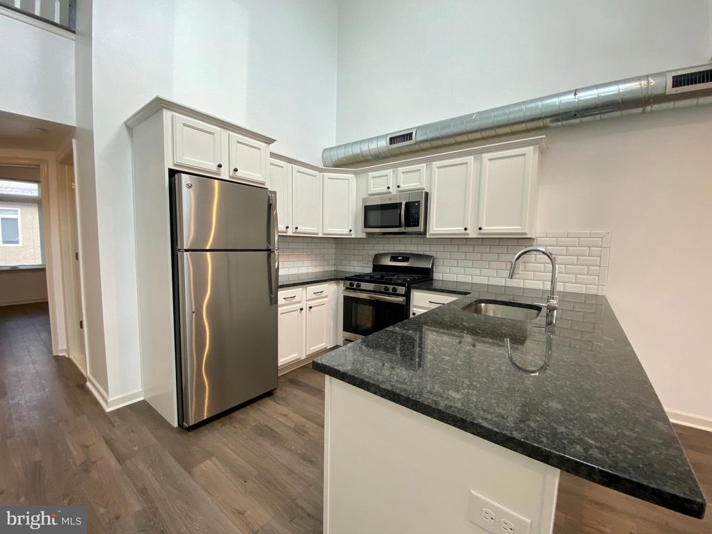 Photo of 6615 Ridge Avenue #105, PHILADELPHIA, PA 19128 (MLS # PAPH2579188)