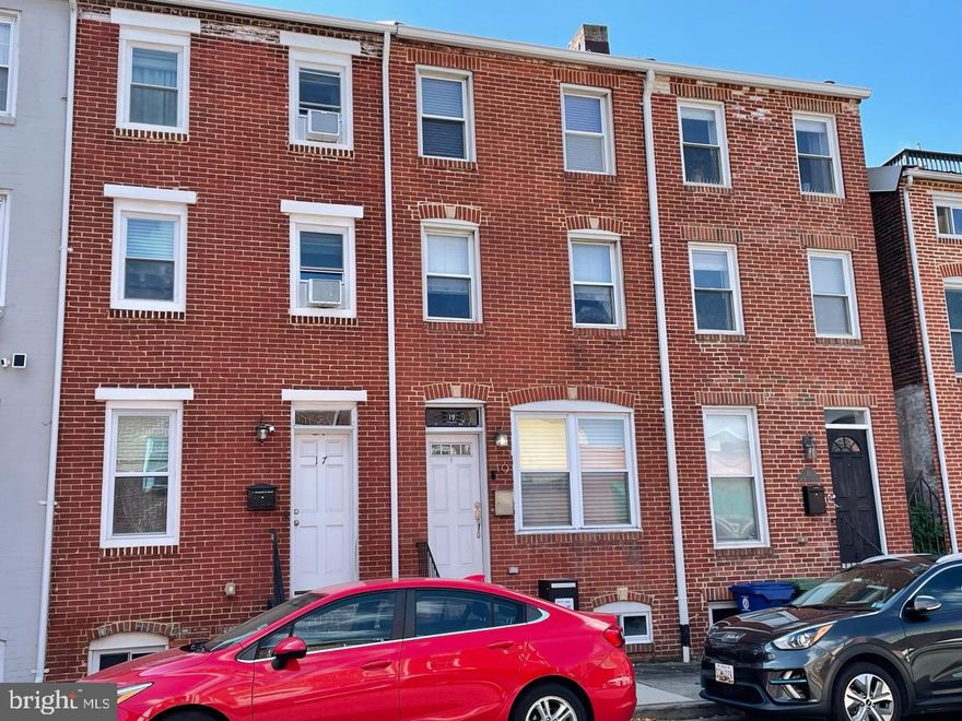 Polished & comfortable 2-bedroom and 2.5-bathroom plus Den Federal Hill townhouse, with 2-car parking pad. Main level has hardwood flooring, brick accent wall, recessed lighting, and ceiling fan. Dining area with available furniture. Kitchen has stainless steel appliances and natural stone counters. Bedrooms are on 2nd and 3rd floors - bedrooms are similar in size with a full bathroom on the same floor as the bedroom. Ceiling fans in bedrooms. Ground level includes a den and utility room with storage and laundry. Parking pad in the back - 2 spaces. Short walk to shops and restaurants. Pet Policy: Cats only with a $200 non-refundable fee per cat. Please reach out for more information and to schedule a showing.