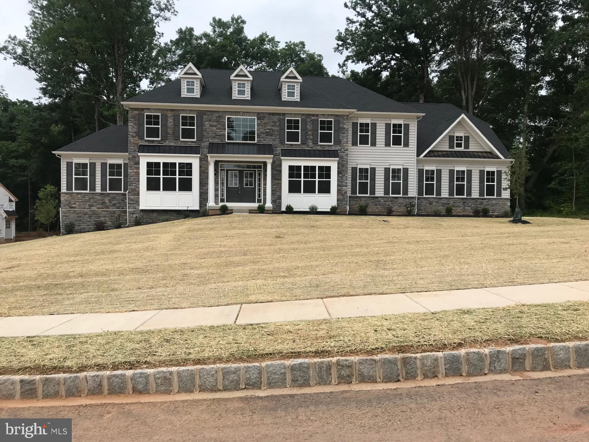 QUICK DELIVERY MODEL HOME AVAILABLE FALL 2023!!!! This exceptional 6,116 square foot estate home is loaded with upgrades. Magnificent kitchen with GE Monogram appliance package including: 6 burner range, Advantium microwave, wall oven, range hood, fridge and wine fridge. Upgraded soft close cabinets in kitchen and all 5 full baths. Quartz countertops in kitchen and all baths. Basement is finished with a full bath and has a walk-up sliding door. 2 story family room with gas fireplace, built in cabinets and wall of windows. Extensive lighting package throughout home. High end tile in all baths and upgraded plumbing fixtures throughout. Luxury master suite with tray ceiling, 3 large walk-in closets, and freestanding tub in bathroom. All other 3 bedrooms have walk-in closets and full baths. All windows and door ways are trimmed throughout. Larger baseboards and casing also added throughout. Mudroom with cubbies and cabinetry in laundry room. 75 gallon hot water heater. And much more. A MUST see home!!! - Oak Ridge is truly a one-of-a-kind community. Nowhere else in the Horsham, PA area will you find estate homes that offer exquisite home designs, an A+ location and superior rated schools in this price range. This desirable community is situated on a generous one-acre homesite. Close to both the Pennsylvania Turnpike and Route 309, the location boasts easy access to popular suburban destinations, job centers, and public transit as well as the history and culture of downtown Philadelphia. Top-rated Horsham schools add to the long list of reasons why the only new estate home community in the Horsham area in its price range is the ideal place to call home.