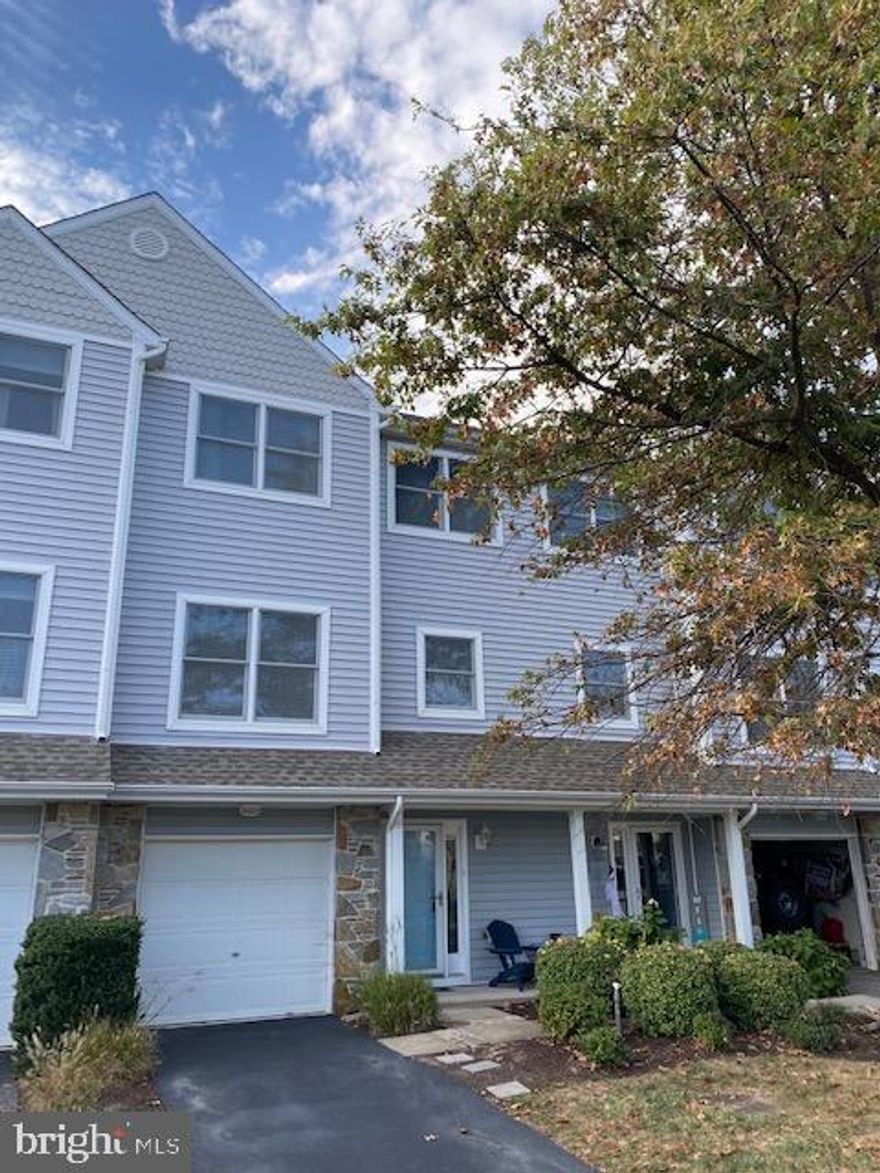 Absolutely stunning Bayside townhouse that is spotless, lovingly cared for by current owners. All trim was just painted, gorgeous lake views from the just painted deck and patio on lower level. This house sparkles with 3 bedrooms, 2 full bathrooms and a half bath on the main level off the kitchen.  All carpeting was just steam cleaned, hot water heater recently replaced, I don't think you will find a cleaner unit in this development.  Live the Chesapeake Bay lifestyle on Kent Island, schedule your appointment today!