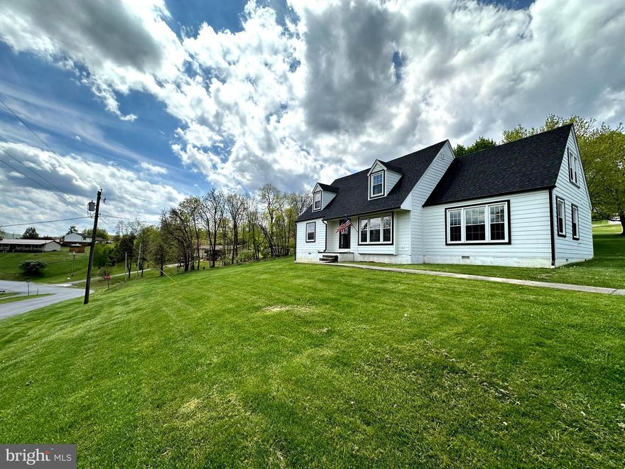 NEW PRICE!  Well below appraised value................. Spectacular & completely renovated home located in a Franklin WV.   In 2022, This Home Was Thoughtfully Renovated For Modern Day Living Yet Preserved The Historic Elements That Add To Its Character & Charm. With over 2880 Sqft of living space, your comfort levels will be lifted with the abundance of Natural Lighting found in this home.  Open Concept Kitchen/Dining Area Offers White Shaker Cabinetry & bar seating, Quartz Countertops, S.S. Appliances, 5 burner Thermador Gas Stove, Pot Filler, Oversized Fridge, dishwasher & under the counter microwave.  Sliders lead off the dining area to the covered patio, which offers a great outdoor space for relaxation and entertaining.  Grab a book and relax by the gas fireplace in the living area that opens to the kitchen.  This versatile 5 bedroom, 3 Full bath property has a floor plan that offers the primary bedroom/bath on the main floor.   The primary suite with combo walk-in closet/laundry area w laundry chute, tiled walk-in shower with  glass enclosure and expansive double sink makes you never want to leave home.  An oversized mud room is awesome for getting out of the weather and organizing outerwear & shoes.  This level also gives you the choice of a second bedroom, office or den and another Full Bath.  Upstairs are 3 bedrooms, 1 spacious guest bath, family/playroom and some large unique storage space.  Storage for the outdoor equipment and toys can been found off the covered patio.  The Complete renovation included new heating & cooling zoned systems, architectural shingled roof, gleaming, eye-catching flooring, recessed lighting, ceiling fans, beautiful light fixtures, insulation, updated plumbing & electric & on demand gas hot water heater.   Welcome to Small Town America where you can live out your Cape Cod dreams with stunning VIEWS, sunrises, a 10 minute stroll to downtown and National Forest Recreation areas just minutes away.  Call now!