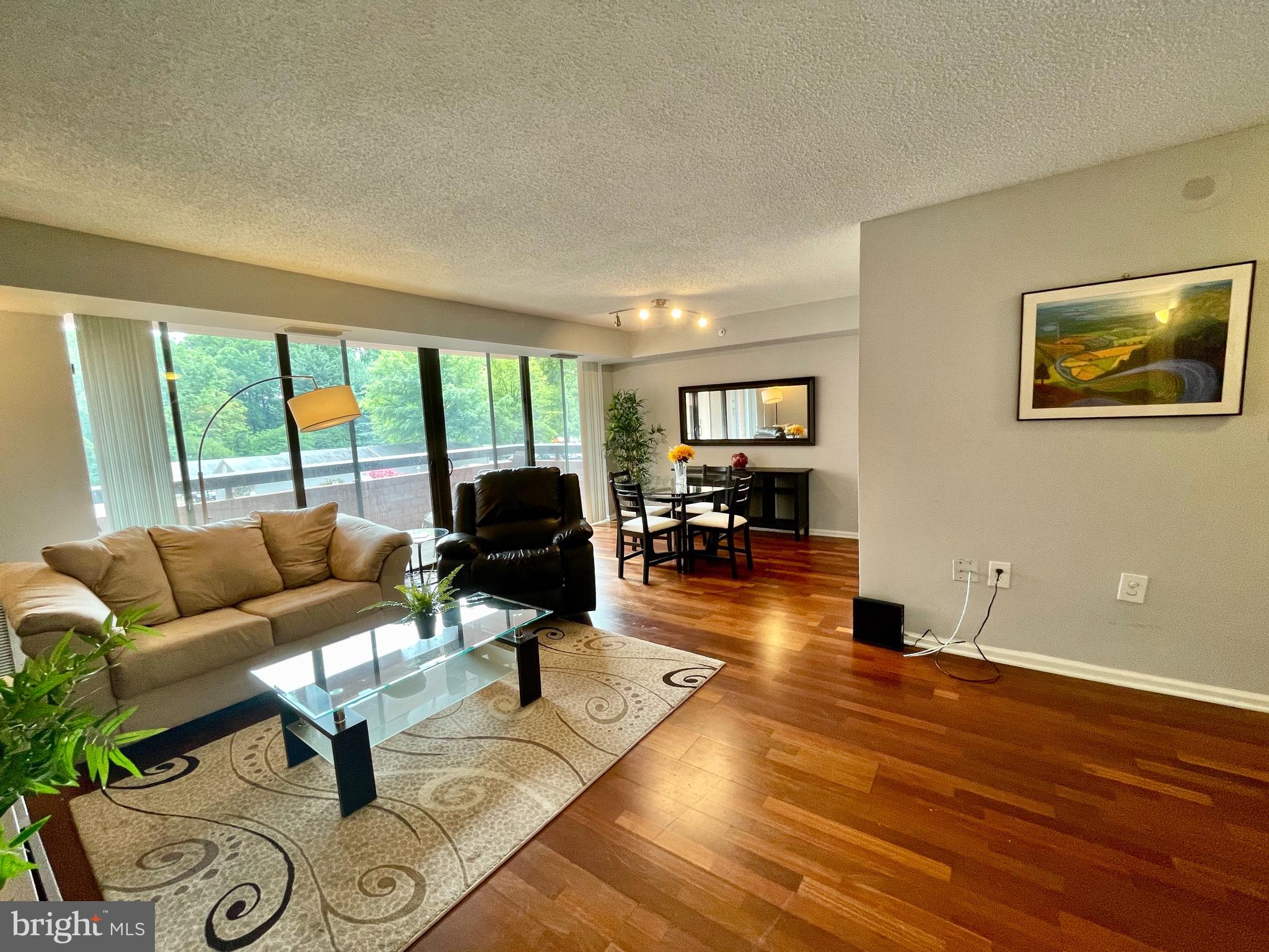 Beautiful 1BR/1BA Rental condo in great gated building on 20+ wooded acres. Freshly painted, new carpet in BR, wood floors in living area. Roomy 100 sq ft private balcony and wall of sliding glass doors let in bright, east-facing sun. SS appliances, granite counters in kitchen and bath. Stacked washer/dryer in unit. Premium parking space conveys and plenty of unreserved parking for visitors. Exceptional value at $1,900/mo.
Great AMENITIES: year-round pool and tennis, 24/7 security, 24/7 fitness center w/locker rooms and sauna, club room, 24/7 front desk personnel, wooded walking trail on property, walk to shopping and cafes, much more!