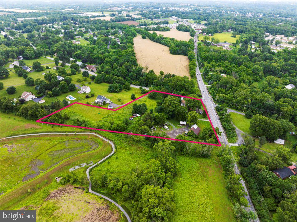 Rare opportunity to own multiple income producing homes plus a barn on 5.4 acres. There are 2 parcels 3.4 acres and 2 acres. This would be great for a contractor or for redevelopment. High visibility. There are two duplex buildings and a large barn. Rents are below market value at $30,324 yearly, projected $90,000 yearly. Amazing location along 724 in East Vincent Township. Two Tax ID's (3854 Schuylkill Rd 21-05-0177), (3856 Schuylkill Rd 21-05-0177.0300)
