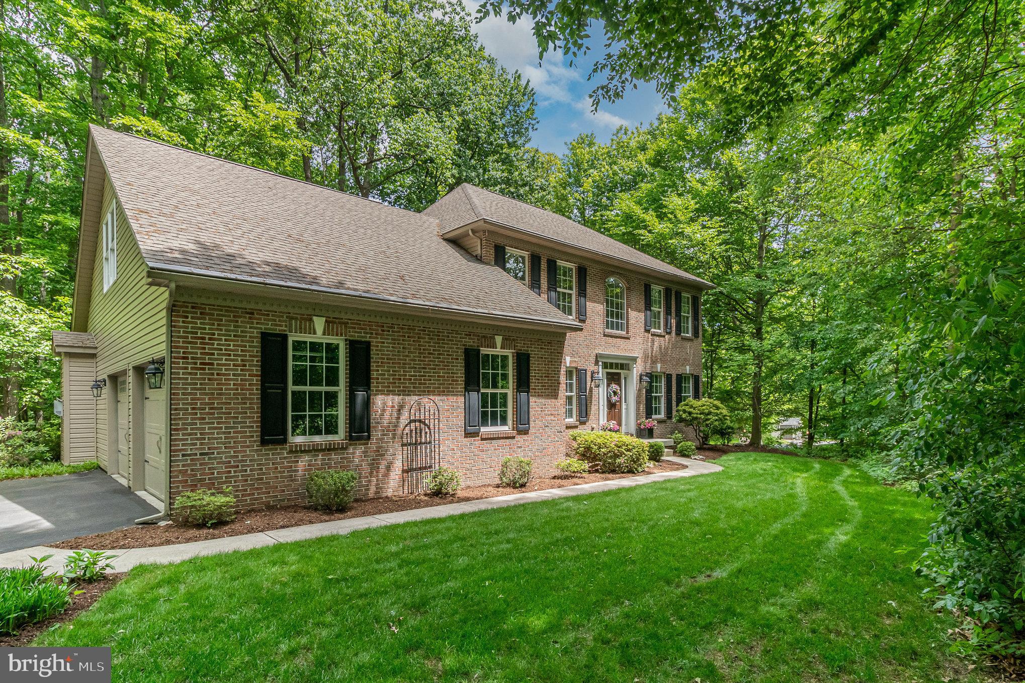 Don’t miss this beautifully maintained 4-bedroom, 2.5-bath home in the desirable Forest Ridge Estates community, located in South Londonderry Township within the Palmyra Area School District. Set on a private, wooded one-acre corner lot, this home offers timeless curb appeal with an all-brick front and side-entry garage. Inside, enjoy generously sized rooms, a cozy gas fireplace, and an upgraded kitchen featuring granite countertops and stainless steel appliances. The second floor is finished with hardwood flooring throughout and a custom California Closet system in the primary bedroom. The finished basement provides extra living space with a recreation area and dry bar. Step outside to a spacious stamped concrete patio—perfect for relaxing and taking in the serene, natural surroundings. Wired for back up generator. 500 gallon (owned) propane tank buried on property.