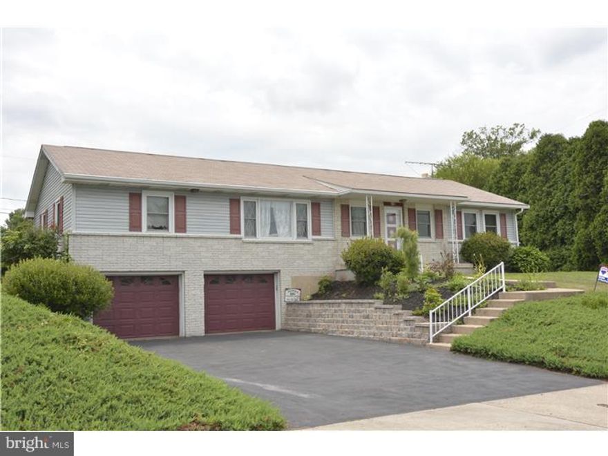 Well-maintained brick/vinyl ranch on wonderful deep lot.  Larger than it appears, the open concept with walls removed has created great space with many options for use.  Living/dining room great room opens to kitchen with lots of cabinets, bar seating and nearby washer/dryer space. All appliances remaining.  Two full baths, two bedrooms with built-in drawers and shelving to maximize space.  Spacious family room adds 600 square feet to living space and features wet bar, recessed lighting, brick wood-burning fireplace with wood box, plus access to rear yard as well as stairs down to two-car garage and storage room.  Replacement windows, professionally landscaped with paver block wall and perennials. Convenient to schools, pool and major roadways. Fast possession possible. Basement recently waterproofed by Foundation Experts with paperwork available in TREND with SDS.