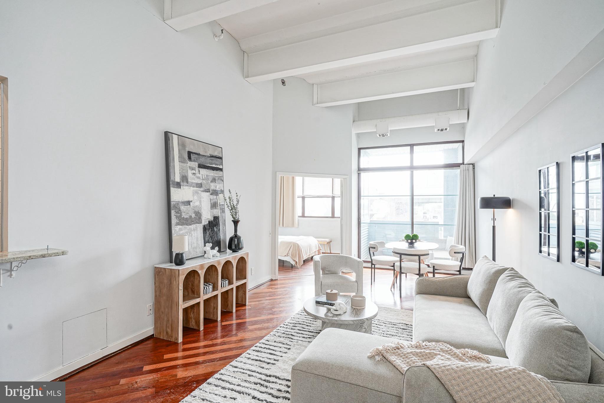 "SELLER PAID OFF ASSESSMENT BALANCE IN FULL!" Southern facing unit with expansive water views! Beautifully updated 1 Bedroom 1 bathroom unit offering a blend of contemporary elegance. Boasting impressive 15 ft. high ceilings and an open concept layout, this home is flooded with natural light, creating a bright and airy ambiance. Enjoy water views and the allure of city living. Inside, cherry hardwood floors lend a touch of sophistication, complementing the modern aesthetic of stainless steel appliances in the kitchen. New HVAC/Water heater & washer/dryer! The inclusion of 1-car parking provides convenience and peace of mind in this vibrant urban setting. Ideal for those seeking both style and functionality, this unit represents a rare opportunity to experience refined city living at its best. Pier 3 is a pet-friendly, private Residence that includes an indoor heated pool, brand new state of the art fitness center, brand new lobby, 24hr concierge service and a gated indoor parking garage. Multiple common areas feature unrivaled Ben Franklin Bridge and river views. The perfect building for entertaining guests offering visitor parking! Option to park your own boat directly outside of the building on the docks through the Marina. Pier 3 is situated in America's most historic neighborhood. Residing at this location allows easy access to Old City restaurants, shopping, art galleries, and Penn's Landing concerts and festivals! New neighborhood dog park on Penn's Landing along with Spruce Street Harbor Park! Quick walk to Cherry Street Pier, Race Street Pier, "La Peg" at the Fringe Arts Building and Morgan's Pier! Minutes to bridges, I-95, I-76, and PHL Airport.