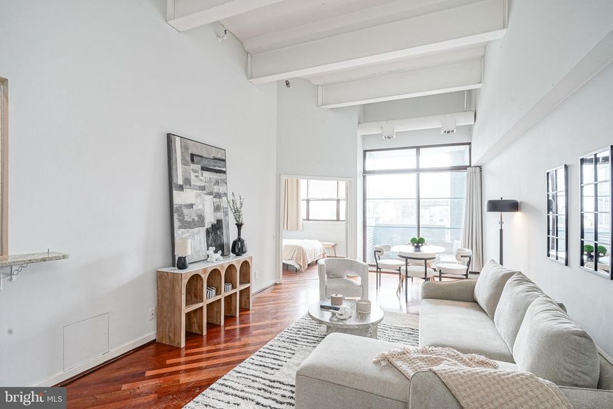 "SELLER PAID OFF ASSESSMENT BALANCE IN FULL!" Southern facing unit with expansive water views! Beautifully updated 1 Bedroom 1 bathroom unit offering a blend of contemporary elegance. Boasting impressive 15 ft. high ceilings and an open concept layout, this home is flooded with natural light, creating a bright and airy ambiance. Enjoy water views and the allure of city living. Inside, cherry hardwood floors lend a touch of sophistication, complementing the modern aesthetic of stainless steel appliances in the kitchen. New HVAC/Water heater &  washer/dryer! The inclusion of 1-car parking provides convenience and peace of mind in this vibrant urban setting. Ideal for those seeking both style and functionality, this unit represents a rare opportunity to experience refined city living at its best. Pier 3 is a pet-friendly, private Residence that includes an indoor heated pool, brand new state of the art fitness center, brand new lobby, 24hr concierge service and a gated indoor parking garage. Multiple common areas feature unrivaled Ben Franklin Bridge and river views. The perfect building for entertaining guests offering visitor parking! Option to park your own boat directly outside of the building on the docks through the Marina. Pier 3 is situated in America's most historic neighborhood. Residing at this location allows easy access to Old City restaurants, shopping, art galleries, and Penn's Landing concerts and festivals! New neighborhood dog park on Penn's Landing along with Spruce Street Harbor Park! Quick walk to Cherry Street Pier, Race Street Pier, "La Peg" at the Fringe Arts Building and Morgan's Pier! Minutes to bridges, I-95, I-76, and PHL Airport.