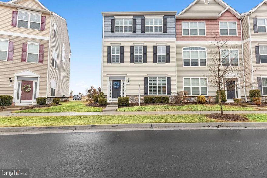 This charming three-level townhome offers spacious and versatile living. 

The entry level features a large, welcoming foyer, a bedroom or office, and a convenient half bath. Just a few steps lead you up to the main living area where the great room, kitchen, and dining room flow seamlessly together. The kitchen boasts a large island, perfect for gatherings, and opens onto a west-facing deck ideal for enjoying beautiful sunsets. The home overlooks an open field, adding a peaceful touch.

The third level hosts a spacious primary suite with a walk-in closet and private bath, plus two additional sizable bedrooms and a second full bathroom. Laundry is also located on this top floor for added convenience.

The community enhances your lifestyle with playgrounds, a pool, and a dock. Nearby, you'll find plenty of dining options, shopping, and easy access to the Bay Bridge, making this home both comfortable and well-connected.