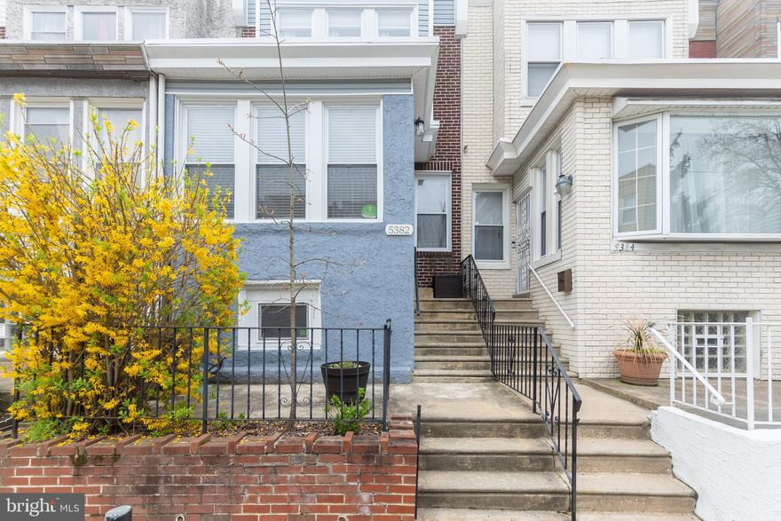 RECENT PRICE REDUCTION! Come see this cute GEM in Wynnefield! Renovated in 2016 with designs that combine modern trends and rustic/industrial elements for a well-blended style. This home has all the features and amenities you'd expect from new construction AND character you just won't get in the new build! Enter from the front door via secure video doorbell that allows smartphone entry. Open the front door to a bright living area, which leads to the open concept first floor living space. The living room, dining area and kitchen flow into each other for seamless interaction and enjoyment. A convenient half bathroom powder roof is located on the first floor - a rare find in similar homes. Beyond the kitchen, you can step directly outside to a MASSIVE deck, for BBQs, socializing and entertainment. The stunning kitchen was upgraded in 2017 with high-end appliances such as a five-burner gas range, built-in microwave, and ultra-quiet dishwasher. Check out the high-design subway tile backsplash and dark cabinetry! Soft-closing cabinet doors and drawers have the feel of luxury, complemented by gorgeous granite countertops. Upstairs, you will find the master bedroom, featuring double closets with custom shelving. Down the hall are two more bedrooms and a generous hall bath, featuring an extra-deep storage nook. Enjoy the skylight in the bathroom! The basement is finished with tile flooring, a comfortable fourth room that can be multi-purpose, a full bath, an enclosed laundry closet, AND a one-car garage! The lower level has its own access door to the outside, giving you flexible options on how to use the extra space. Additional "smart home" features allow you to control the front door, the heat and A/C, and other devices via your smartphone, with an expandable "smart hub" that lets you add components over time. Blonde bamboo floors throughout. All-new as of 2017 plumbing, electrical, high-efficiency gas furnace, A/C, low-E windows, water heater, and more! This home is walking distance to many local shops and restaurants, and is convenient to both public transportation as well as all major roadways. Enjoy a stroll to Fairmount park and the Mann Music Center or shopping on City Line Ave.