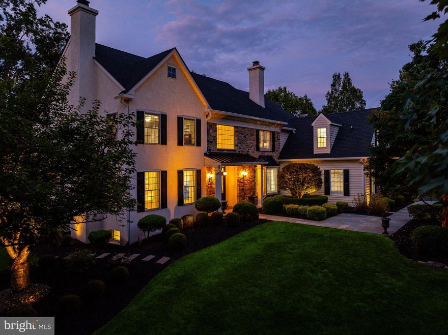 Welcome to Foxfield Reserve, Lower Gwynedd’s most cherished and walkable luxury Enclave. Set along a private, tree-lined road with sidewalks and direct access to one of the township’s premier walking trails, this home strikes the perfect balance between connection and quiet. Just steps from top-ranked Wissahickon schools—elementary through high school—families will love the ability to walk beneath a canopy of mature trees on their way to school or enjoy the convenience of a quick commute. Beautifully updated and intentionally crafted over the years, this 5-bedroom, 4 full and 2 half bath residence offers comfort, flexibility and 6162 SF—perfectly suited to today’s active and often multi-generational households. Step inside to find newly refinished hardwood floors that guide you through expansive formal living and dining rooms, where the living room is anchored by a stunning marble-tile fireplace. A refined home office is suitable for any executive and offers the quiet and privacy needed for productivity, while the light-filled family room features vaulted ceilings, custom built-ins, and a second gas fireplace that invites relaxation. Just beyond, the sunroom—wrapped in glass and bathed in natural light—provides peaceful views of the backyard and is the perfect place for your morning coffee or an evening glass of wine. At the heart of the home, the kitchen is a true showstopper! Custom inset cabinetry, a Wolf 6-burner range, Subzero refrigerator and freezer columns, Bosch dishwasher, double wall ovens, and a walk-in pantry speak to the culinary enthusiast. The honed Calcutta marble island is a stunning focal point, while soapstone counters in the butler’s pantry and quartz perimeter countertops add to the elegance and durability of this exceptional space. Two stylishly renovated powder rooms, a thoughtfully designed mudroom with custom built-ins, upgraded lighting, stunning millwork, and smart switches throughout speak to the level of detail poured into every corner of the home. New sliders and windows— strategically replaced for both energy efficiency and aesthetics—let natural light pour in across all levels. The primary suite offers a true retreat, complete with a spacious sitting room and a dual-sided fireplace. A large, custom walk-in closet is just one of the standout features, alongside an oversized bath with jetted tub, dual vanities, and a walk-in shower. Additional bedrooms are generously sized, with one en-suite featuring a renovated bath and two sharing a refreshed Jack-and-Jill. The walk-out lower level adds another dimension of versatility. With a private fifth bedroom, full bathroom, kitchenette, and home gym, it’s the ideal space for guests, in-laws, an au pair, or long-term multi-generational arrangements. The space is both functional and smart, with updated systems throughout—including two newer HVAC units and a new water heater. Outside, the property is equally impressive. The backyard has been transformed into a tranquil escape, with mature privacy trees, a custom paver patio, wood-burning fireplace, and stone retaining walls with built-in lighting. It's a space designed for everything from evening wine to Fourth of July fireworks. Major exterior improvements include a new roof with skylights, metal accent roofing, freshly painted wood siding, extra-wide gutters, a sprinkler system, and a brand-new driveway. A 24kW whole-house Generac generator ensures you’re never left in the dark. Do you need more reasons to fall in love? The location is unbeatable! Start your day with a walk to Starbucks or Rise Barre, Whole Foods, or run quick errands to CVS and the local bank—all without starting your car. Regional rail is minutes away, and nearby Ambler offers boutique shopping, award-winning restaurants, First Friday festivals, and a Saturday morning Farmers Market that’s a true local gem. Homes in Foxfield Reserve don’t come around often, and when they do... savvy buyers don't wait!