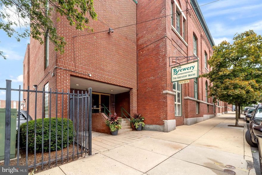 On this tree-lined, residential, Brewerytown block sits this charming lofted one bedroom one bathroom condo unit in the historic Brewery House. #209 features a gated parking spot, brand new stainless steel kitchen suite, windows, hardwood floors, lofty ceilings two walk-in closets and a wood-burning fireplace. The amenities include a washer/dryer, gas stove, dishwasher, built-in microwave, central air and a communal courtyard with a grill. 870 North 28th Street is steps from La Calaca Feliz, Eastern State historical site, Zorba's Taverna, Angelino's Restaurant and Steelworks Strength Systems. With Fairmount and Girard Avenues within walking distance, fine food, drink and shopping are only a walk away. Additionally, this property is located close to the edge of the verdant Fairmount Park and Kelly Drive. Convenient access to I76 is just minutes away. Renters pay for electricity and gas. Dogs are negotiable.