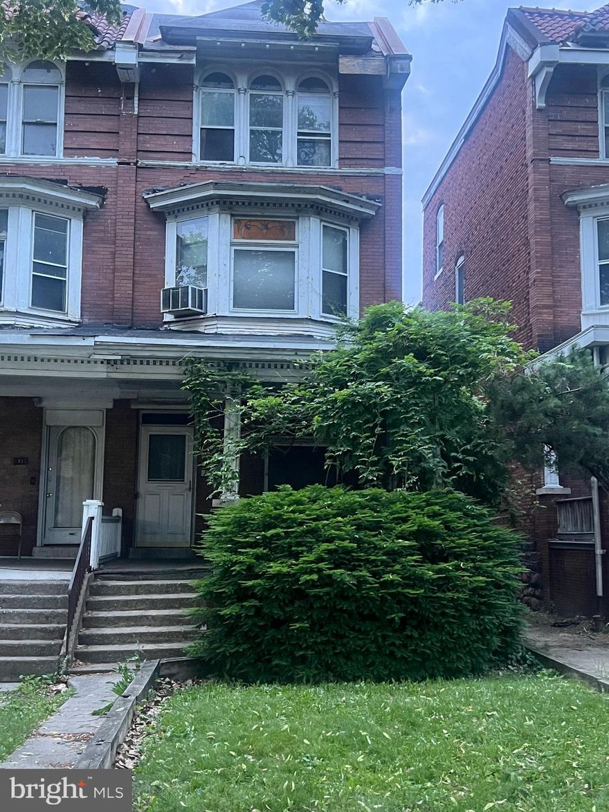 What a gem! Hidden in plain sight.  This property features 5 bedrooms, 1 full bath and 2 half baths, over 2300 livable sq ft, Living room, dining room, stained glass dining room doors, original woodwork, hardwood flooring, and more. Bring it back to life with a little elbow grease, love and imagination!  Close to everything - Reservoir Park, schools, entertainment, public transportation, easy access to the major highways, downtown and etc.