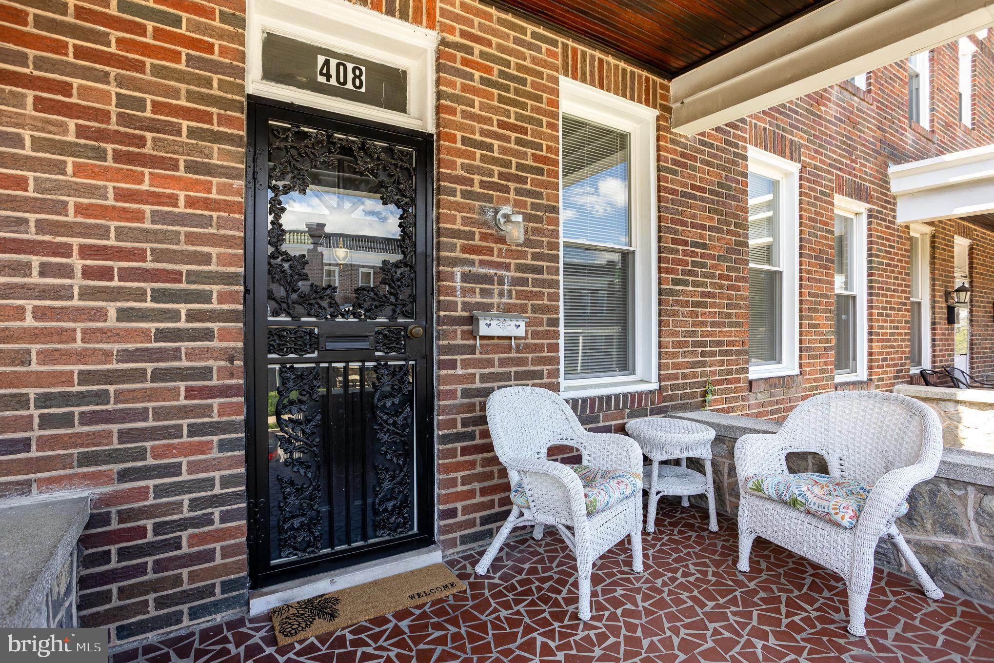 This beautiful freshly painted, porch-front rowhouse, offers a perfect blend of character & contemporary updates. With central AC installed in 2023, gleaming hardwood floors (refinished 2025), and abundant natural light streaming through modern windows (2023), this home is move-in ready and awaits its new owner.
Step into the foyer, then the elegant French doors lead into a cozy living room with mahogany inlaid hardwood floors, then flow into a separate dining area—ideal for hosting formal dinners. The stylish, modern kitchen is built to impress with Quartz countertops and stainless steel appliances, including a refrigerator, range, dishwasher, and pot racks—perfect for cooking and entertaining. You can circle back to the foyer from the kitchen.
Upstairs, you’ll find 3 generously sized bedrooms with hardwood floors and a full bath. The partially finished lower level offers flexible space for a family room, office, or workout area, along with a half bath, laundry, and additional storage. Out back, enjoy a private fenced yard and covered rear porch—a great setup for BBQs, outdoor dining, and letting pets play. Stay comfortable year-round with central air (2023) and efficient radiator heat.
Ask us about down payment and closing cost grants—you might be able to own this home for less than you pay in rent! Don’t miss this opportunity to make this inviting, updated home your own. Schedule your showing today!
